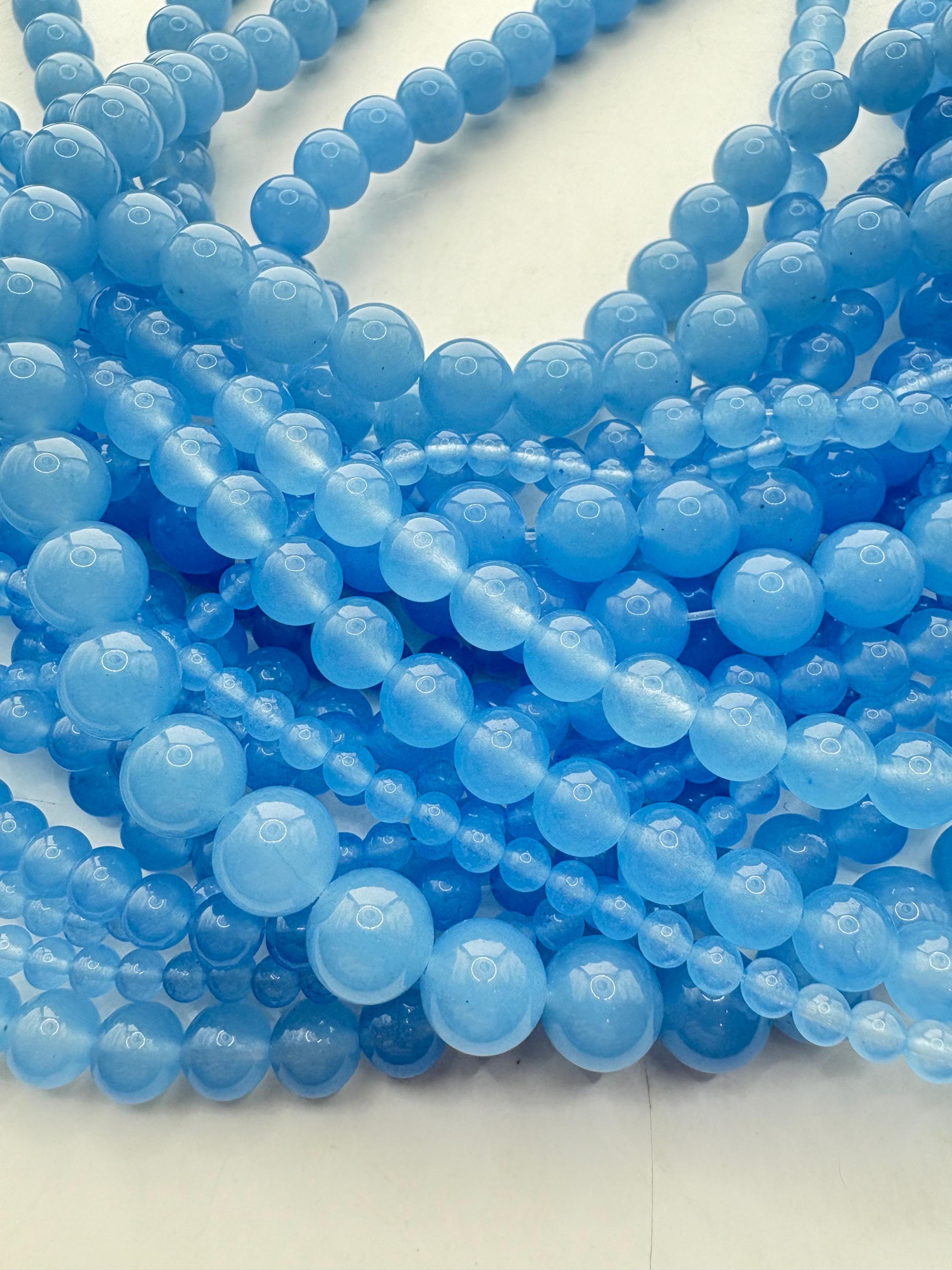 Light Blue Chalcedony Gemstone Beads. 15" Strand High Quality Round Beads, Available 4-10mm. Blue “jade”. Light Blue Chalcedony Gemstone Beads. 15" Strand High Quality Round Beads, Available 4-10mm. Blue “jade”.
