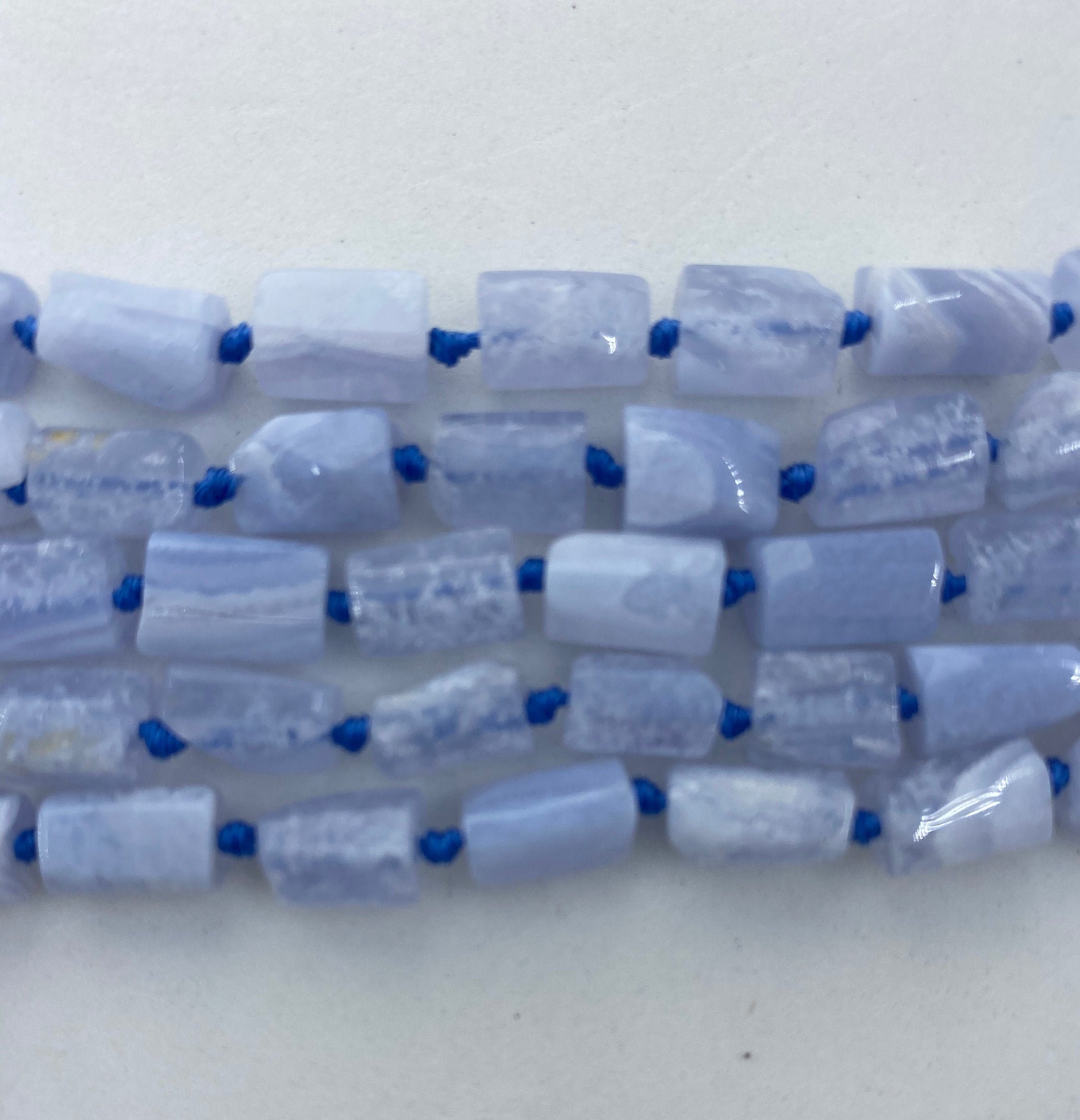 Blue Lace Agate Raw Free Form Gemstone Beads. Full 15" Strand Of 8-12mm Beads, Approx. 34 Per Strand. Blue Lace Agate Raw Free Form Gemstone Beads. Full 15" Strand Of 8-12mm Beads, Approx. 34 Per Strand.