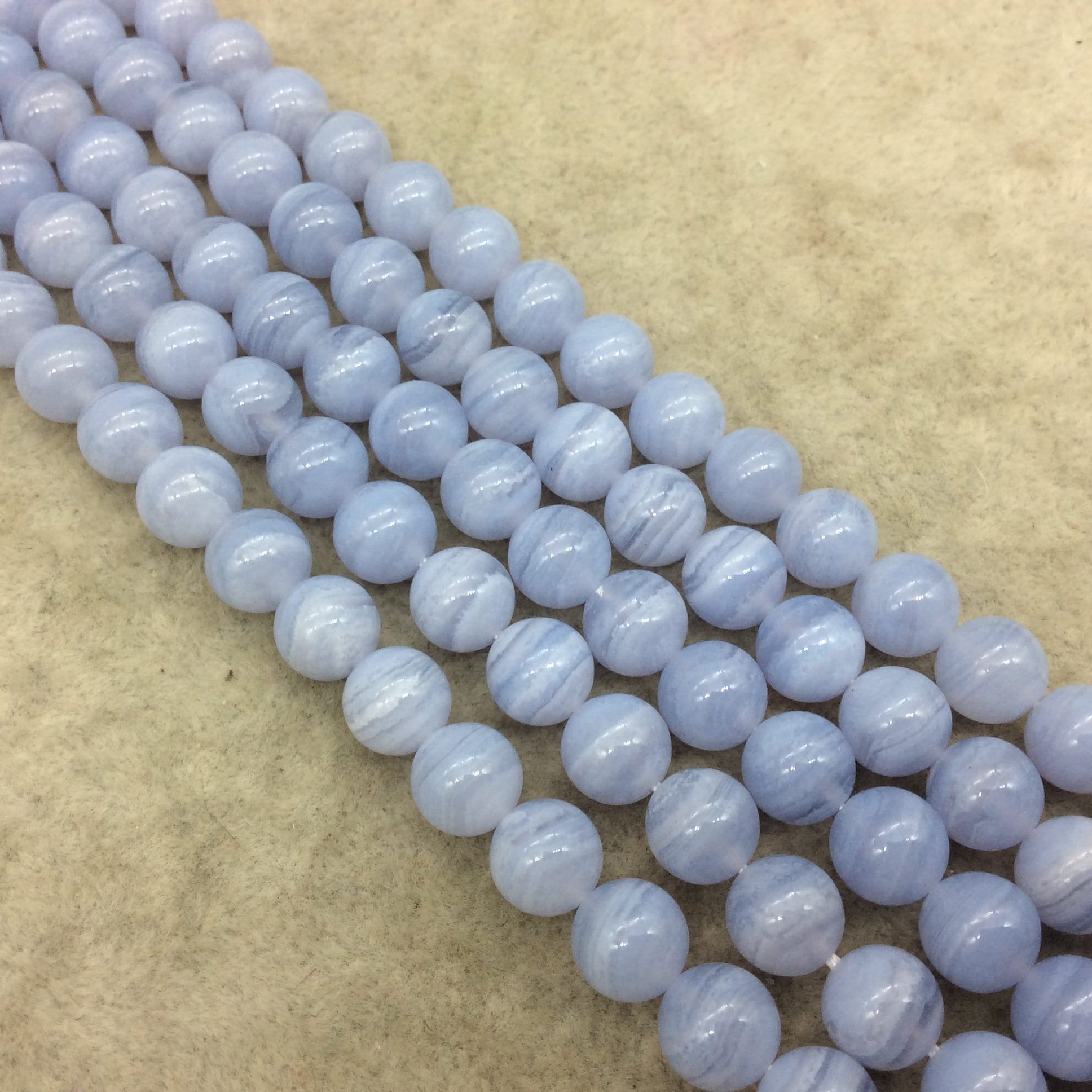 Aaa Natural Blue Lace Agate Smooth Glossy Round/ball Shape Beads W 1mm Holes - Sold By 16" Strands (~ 46 Beads) ~ 8mm Approx. Aaa Natural Blue Lace Agate Smooth Glossy Round/ball Shape Beads W 1mm Holes - Sold By 16" Strands (~ 46 Beads) ~ 8mm Approx.