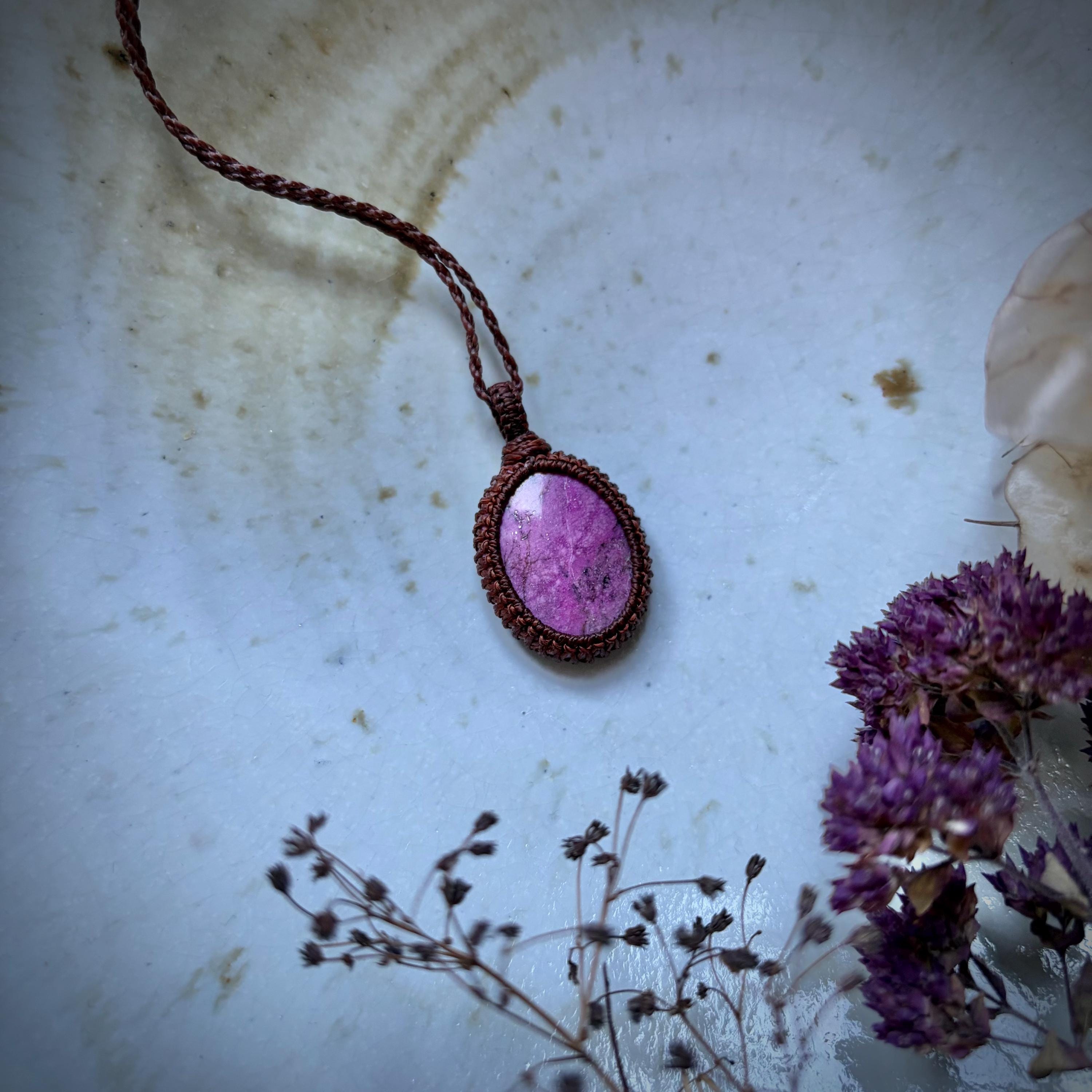 Polished Oval Shaped Cobalto Calcite Stone, Wrapped Into A Necklace With Brown Macramé Cord