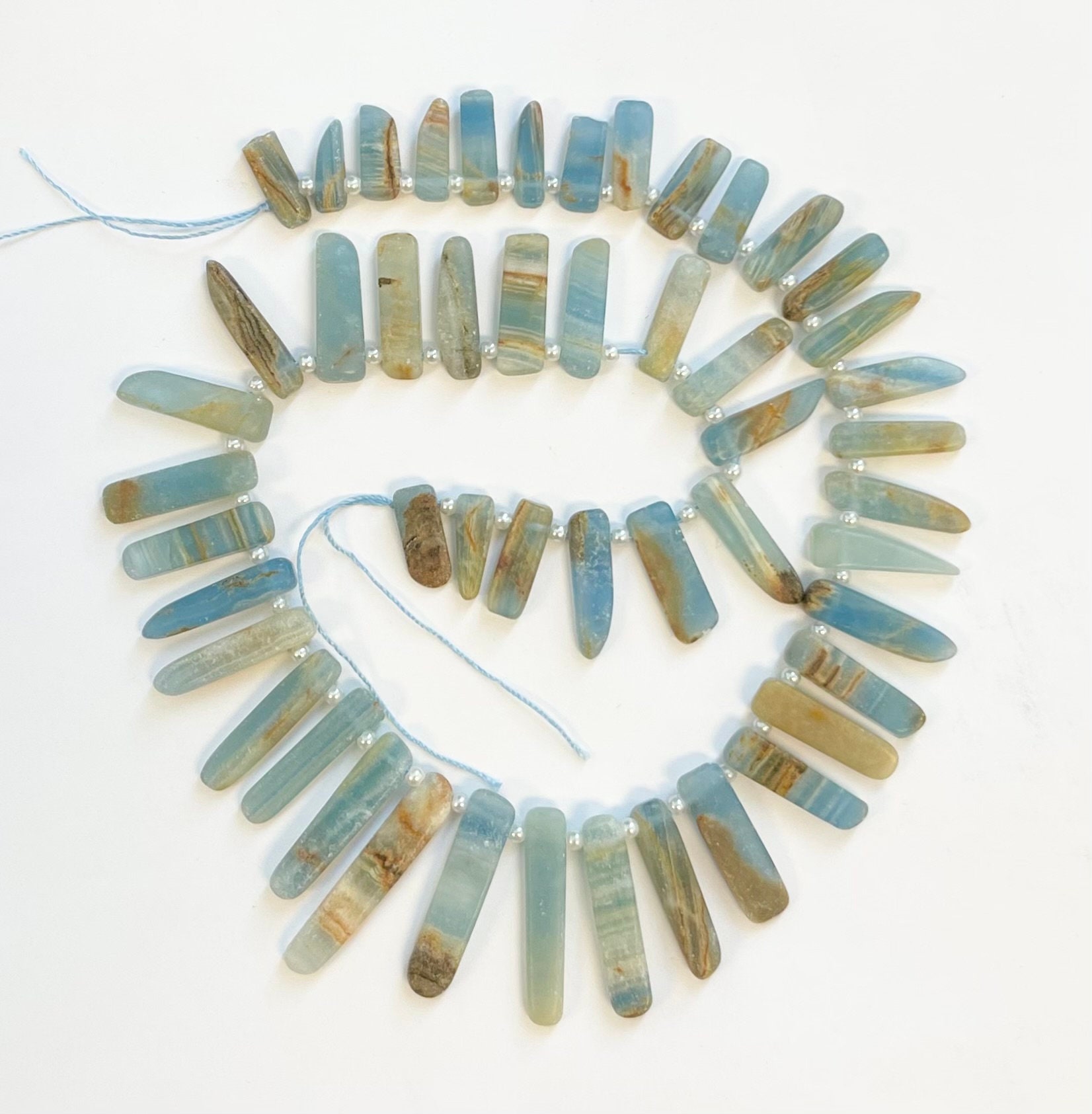 Natural Aquatin Calcite (10-35)x(5-10)x(3-5)mm Flat Shape Gemstone Beads -15.5 Inch Strand Natural Aquatin Calcite (10-35)x(5-10)x(3-5)mm Flat Shape Gemstone Beads -15.5 Inch Strand