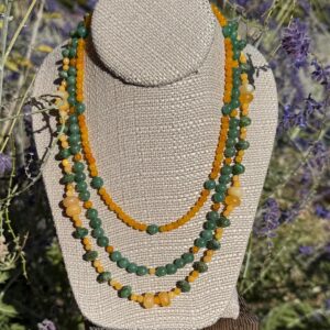 October Aspens, 3 strand necklace of faceted Chrome Diopside rondelles, Green Aventurine rounds and Yellow Calcite. Sterling Silver clasp