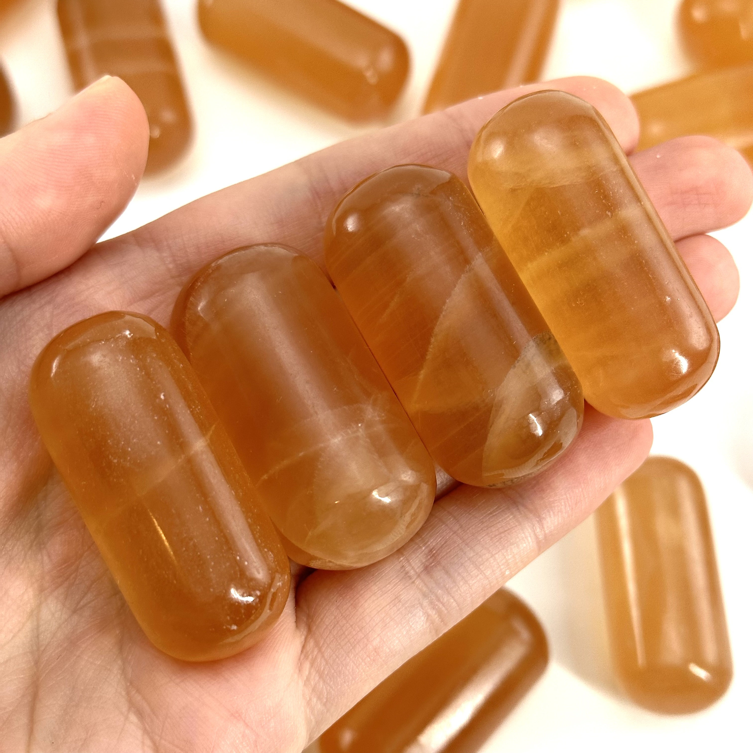 Honey Calcite Worry Stone | Orange Polished Tumbled Crystal Lingam (sacral Chakra) Honey Calcite Worry Stone | Orange Polished Tumbled Crystal Lingam (sacral Chakra)