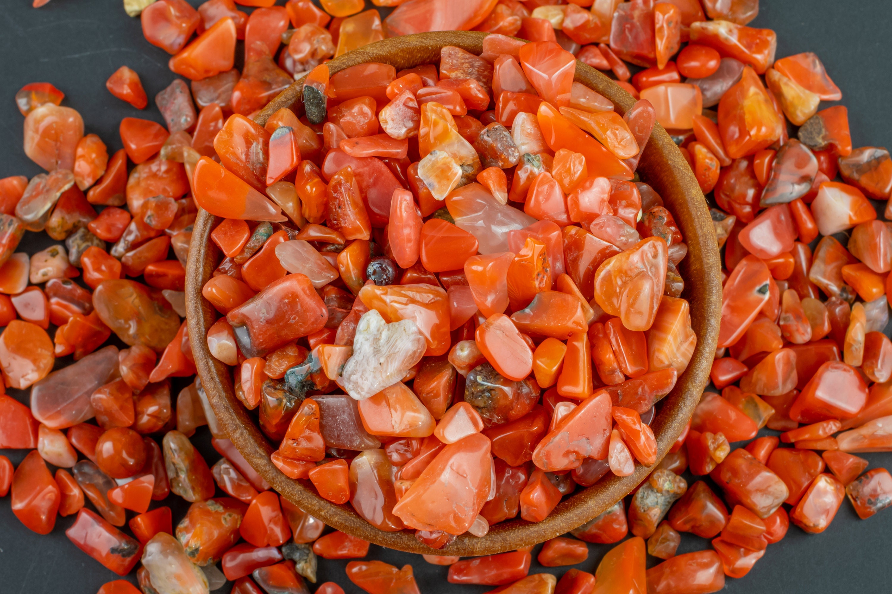 Mini Natural Carnelian Tumbled Nuggets Around .25-.5 Inches Mini Natural Carnelian Tumbled Nuggets Around .25-.5 Inches