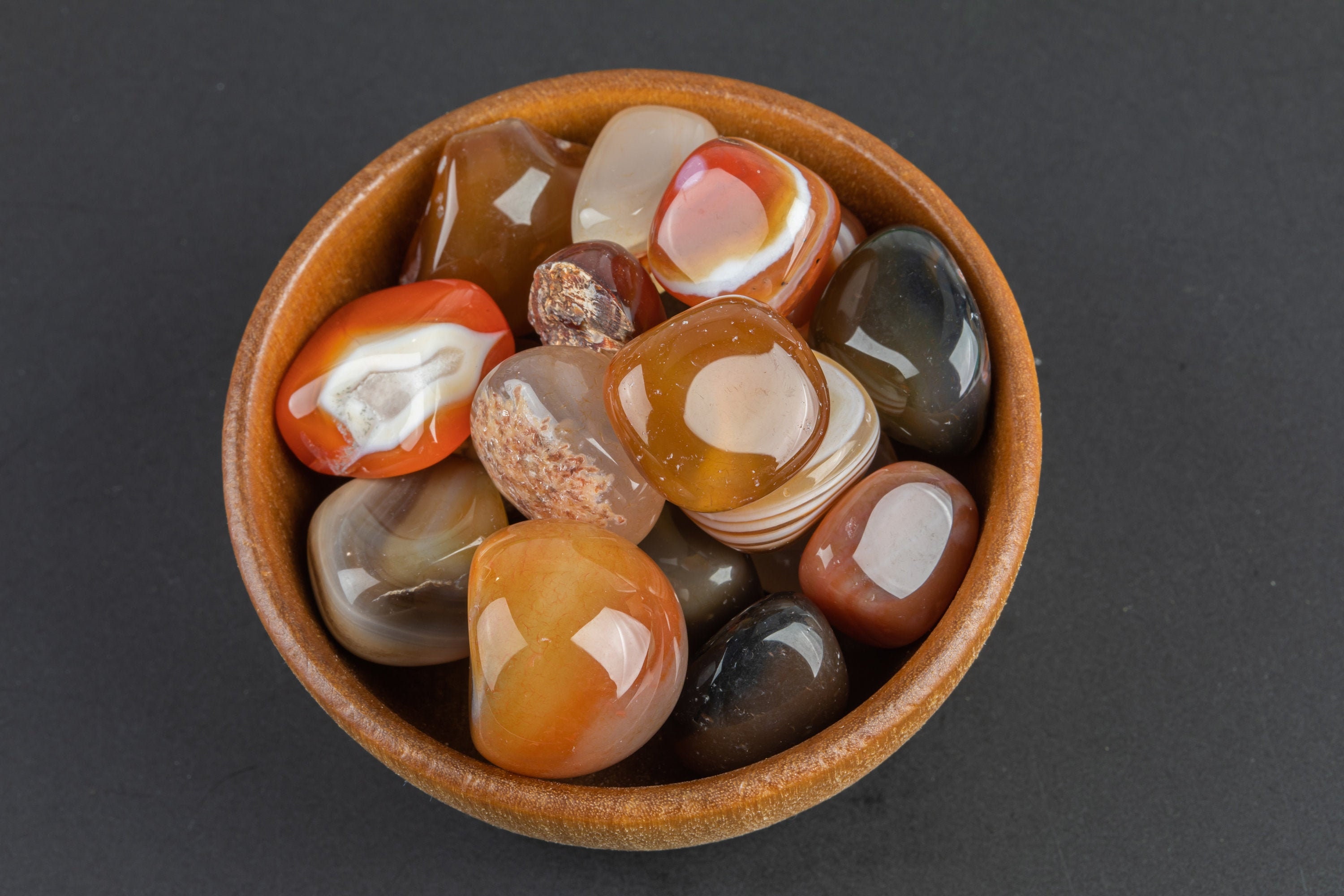 Natural Carnelian Tumbled Nuggets- 100 Grams-3.5 Ounces - .5 Inch-1.5 Inch Size- Roughly 15 Pcs Per Bag Natural Carnelian Tumbled Nuggets- 100 Grams-3.5 Ounces - .5 Inch-1.5 Inch Size- Roughly 15 Pcs Per Bag
