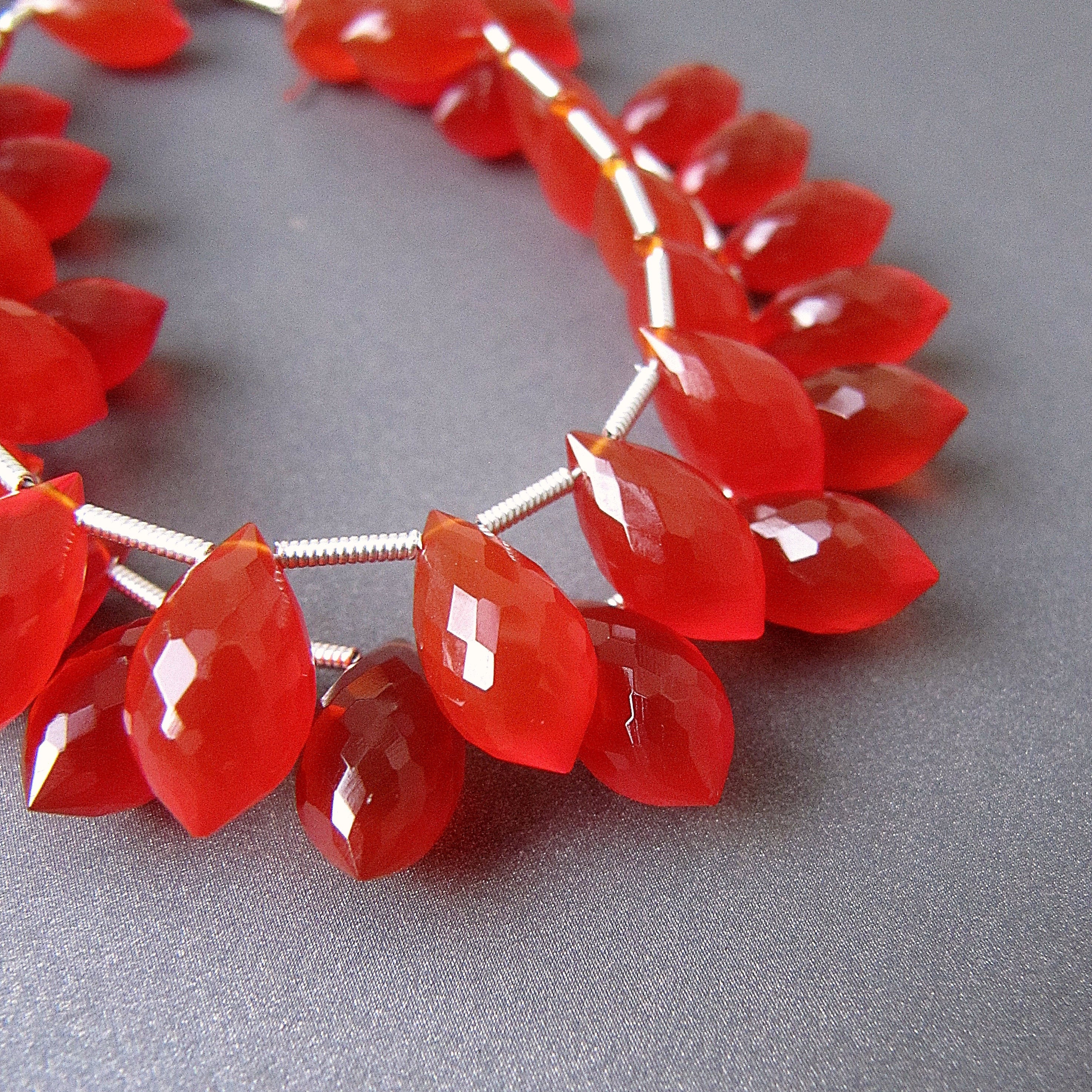 Carnelian Spiky Tear Drops • 12x7mm • Aaa Micro Faceted • Fancy Chandelier Dew Drop Briolettes • Orange Red • Pairs Available Carnelian Spiky Tear Drops • 12x7mm • Aaa Micro Faceted • Fancy Chandelier Dew Drop Briolettes • Orange Red • Pairs Available