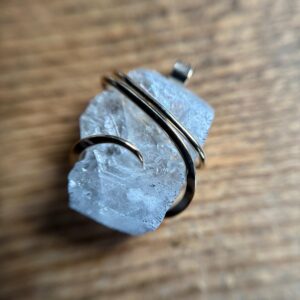 Blue celestite crystal in 14k gold pendant Blue celestite crystal in 14k gold pendant