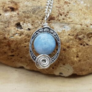 Rare Blue Celestite Pendant necklace. Reiki jewelry uk. Silver plated celestine Wire wrapped oval frame pendant. 10mm stone. C1