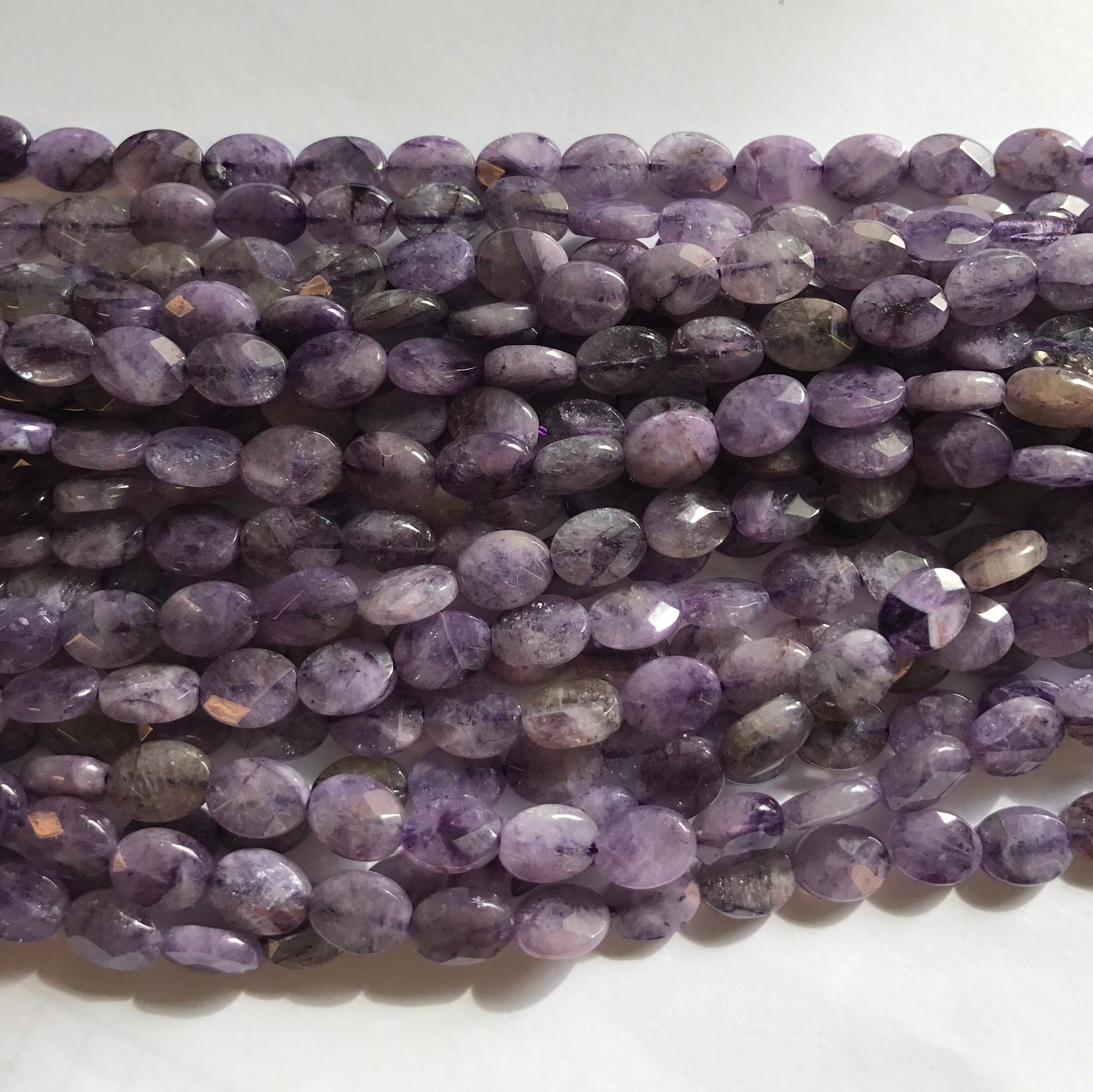 Charoite 8x6x3mm Faceted Flat Oval Gemstone Beads--15.5 Inch Strand