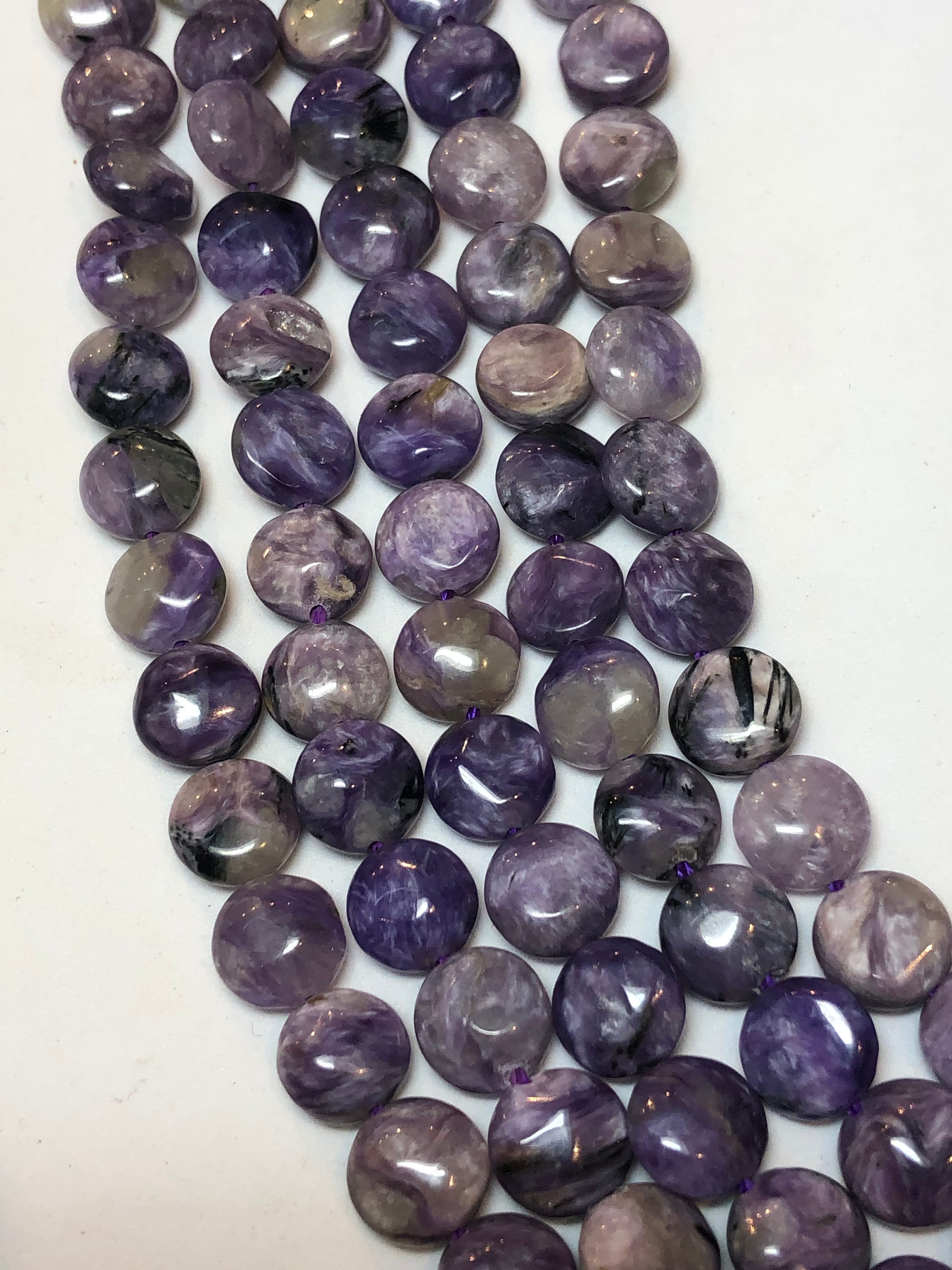 8mm Coin Russian Charoite Gemstone Beads. Full 15" Strand Of Purple Coin Beads, Approx. 50 Beads Per Strand. 8mm Coin Russian Charoite Gemstone Beads. Full 15" Strand Of Purple Coin Beads, Approx. 50 Beads Per Strand.