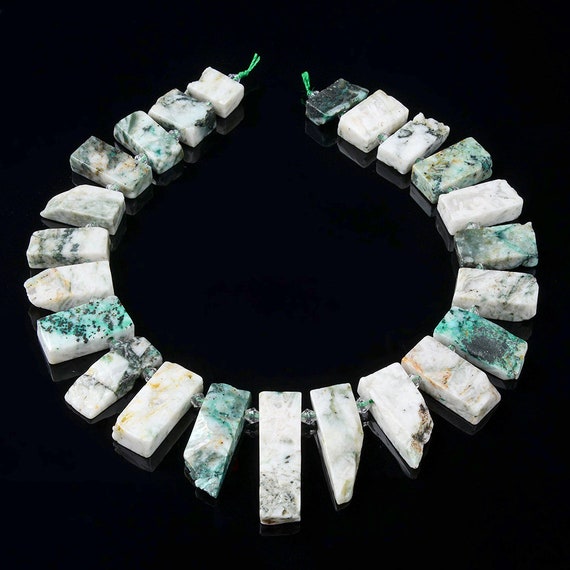 55x14-22x13mm Natural Phoenix Stone Chrysocolla Gemstone Gradated Slice Stick Points Beads 15.5 Inch Full Strand Bulk Lot(80016526-s14) 55x14-22x13mm Natural Phoenix Stone Chrysocolla Gemstone Gradated Slice Stick Points Beads 15.5 Inch Full Strand Bulk Lot(80016526-s14)