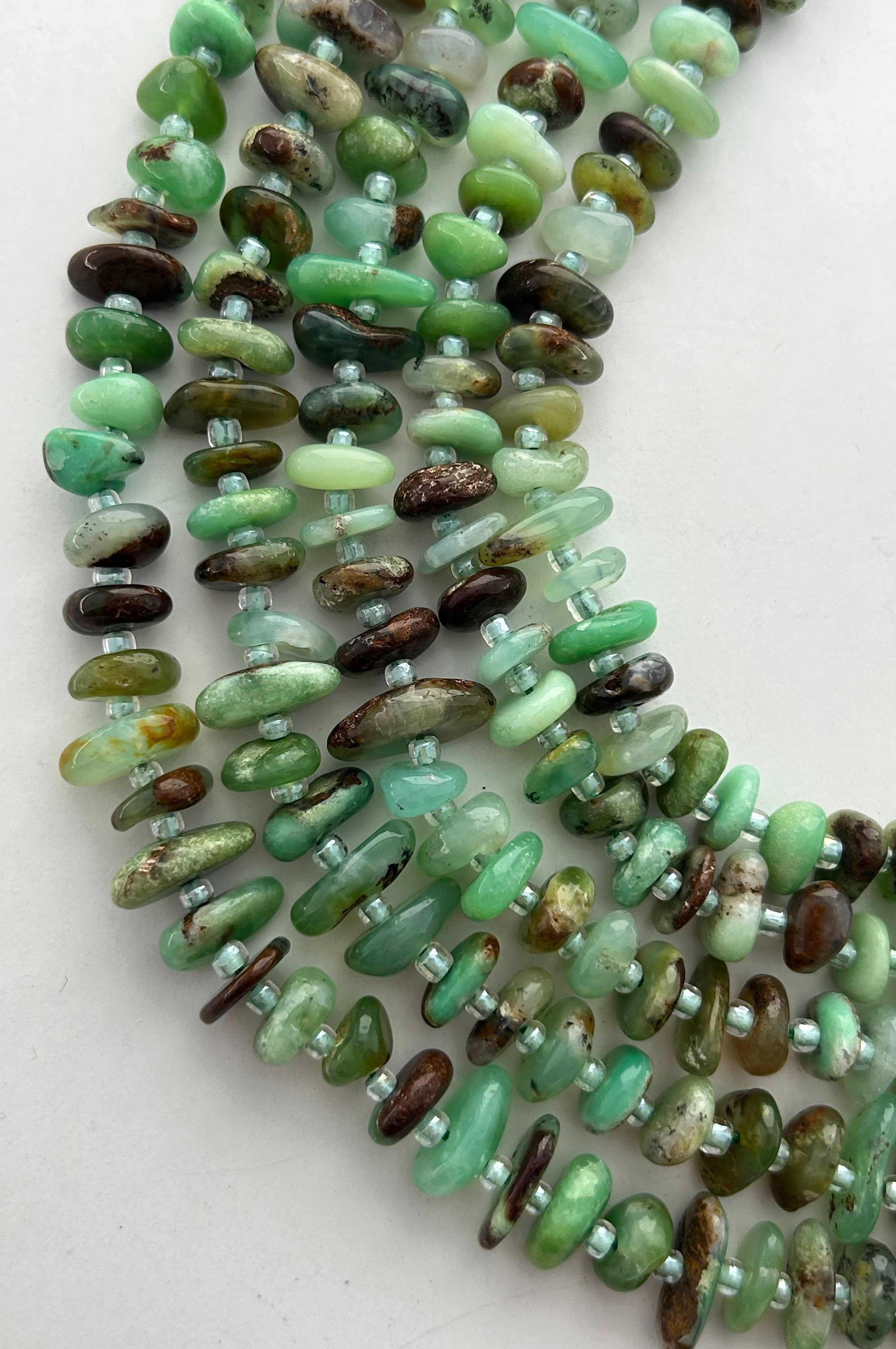 5x8mm - 6x10mm Free Form Natural Chrysoprase Gemstone Beads. 15" Strand Of Flat Mixed Green Nugget Beads, Approx. 64-65 Per Strand.