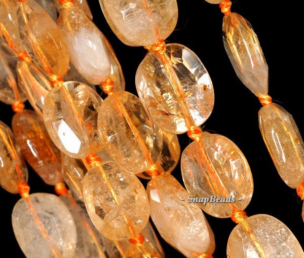 20x15mm Honey Citrine Gemstone Yellow Faceted Nugget Oval Loose Beads 6.5 Inch Half Strand (90145984-425) 20x15mm Honey Citrine Gemstone Yellow Faceted Nugget Oval Loose Beads 6.5 Inch Half Strand (90145984-425)