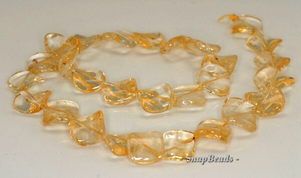 16mm Citrine Quartz Gemstone Twist Diamond Loose Beads 7.5 Inch Half Strand (90144236-b12-521) 16mm Citrine Quartz Gemstone Twist Diamond Loose Beads 7.5 Inch Half Strand (90144236-b12-521)