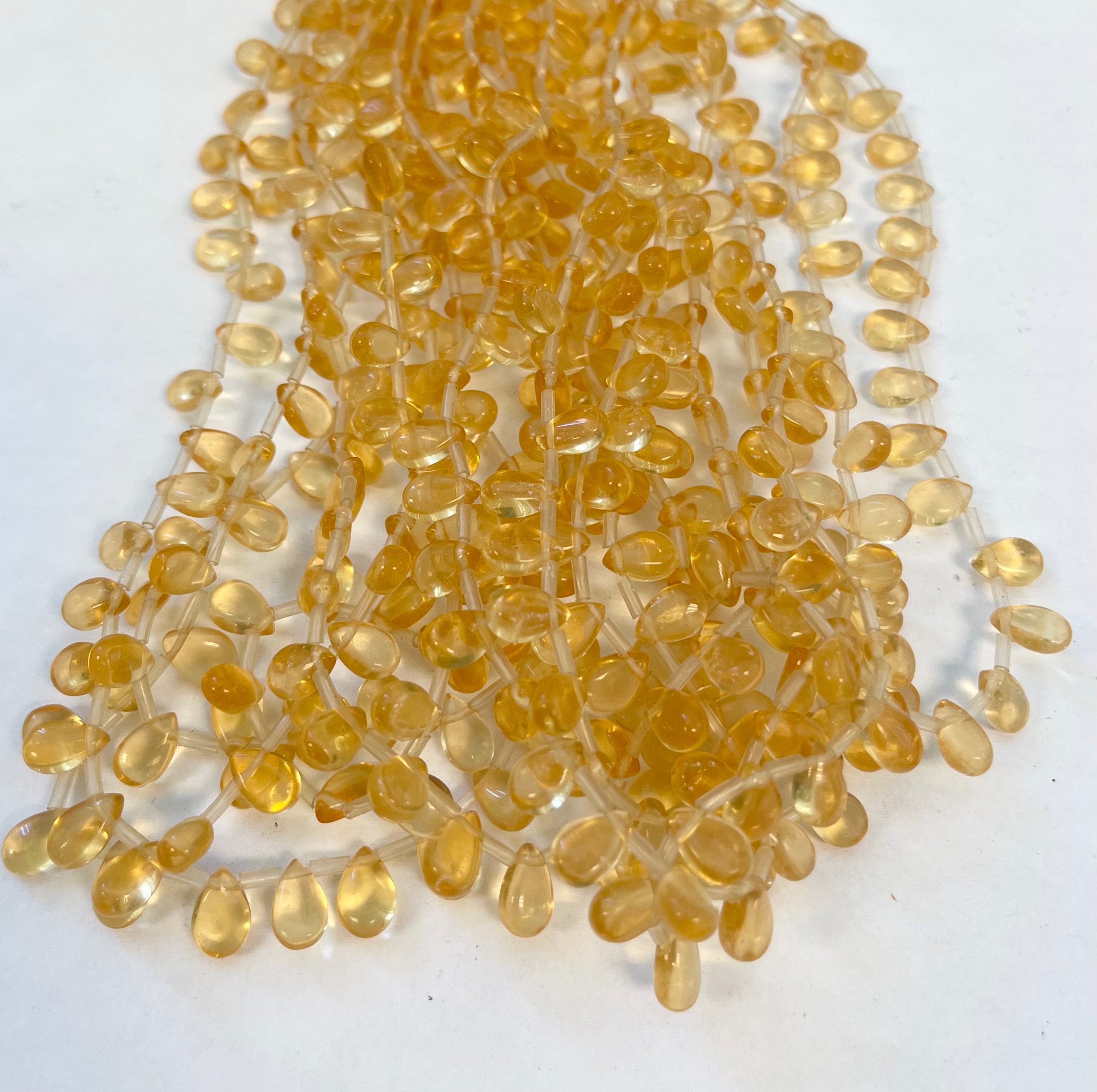 Citrine 9x6x4mm Flat Teardrop Gemstone Beads - 15.5 Inches Strand Citrine 9x6x4mm Flat Teardrop Gemstone Beads - 15.5 Inches Strand