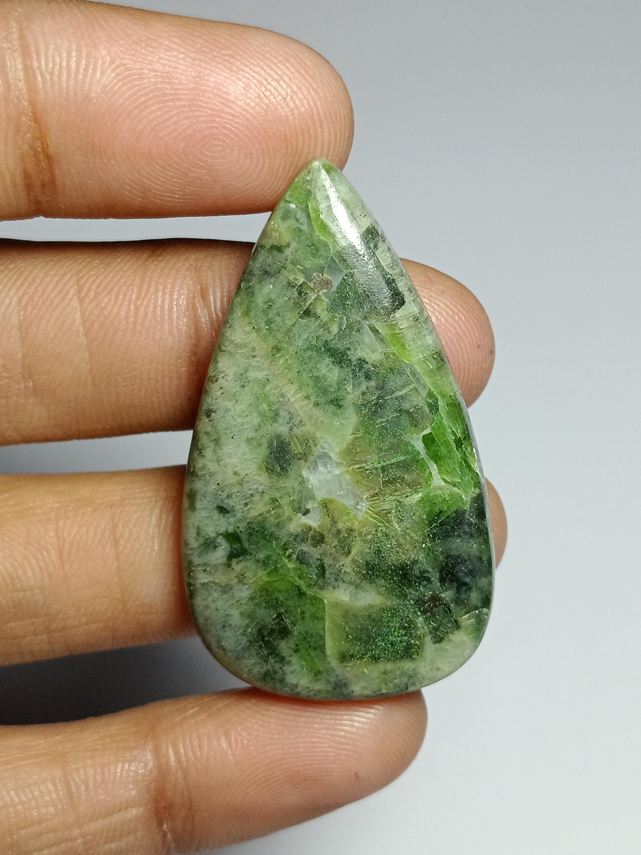 Natural Diopside Cabochon: Loose Gemstone For Jewelry Making (43x25mm, 57cts) Natural Diopside Cabochon: Loose Gemstone For Jewelry Making (43x25mm, 57cts)