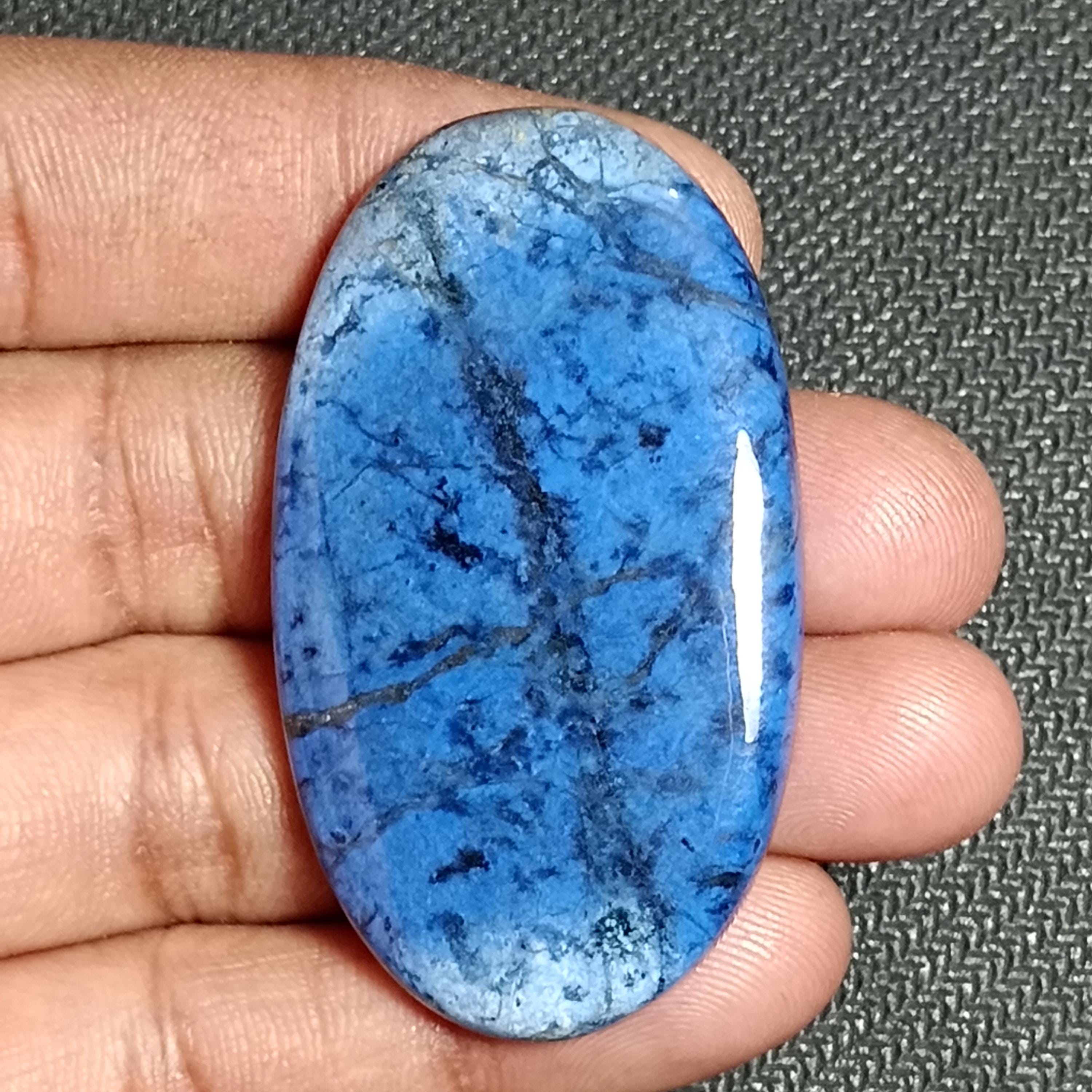 Dumortierite Quartz Cabochon, Gemstone (119cts. 53 X 30 Mm) Dumortierite Quartz Cabochon, Gemstone (119cts. 53 X 30 Mm)