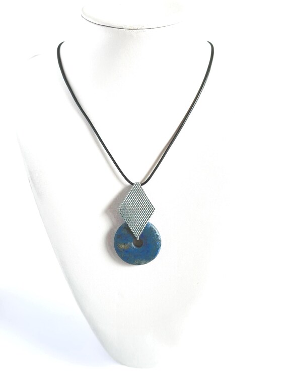 Dumortierite Donut Pendant Necklace: Beaded Bail, Adjustable Nylon Cord Dumortierite Donut Pendant Necklace: Beaded Bail, Adjustable Nylon Cord