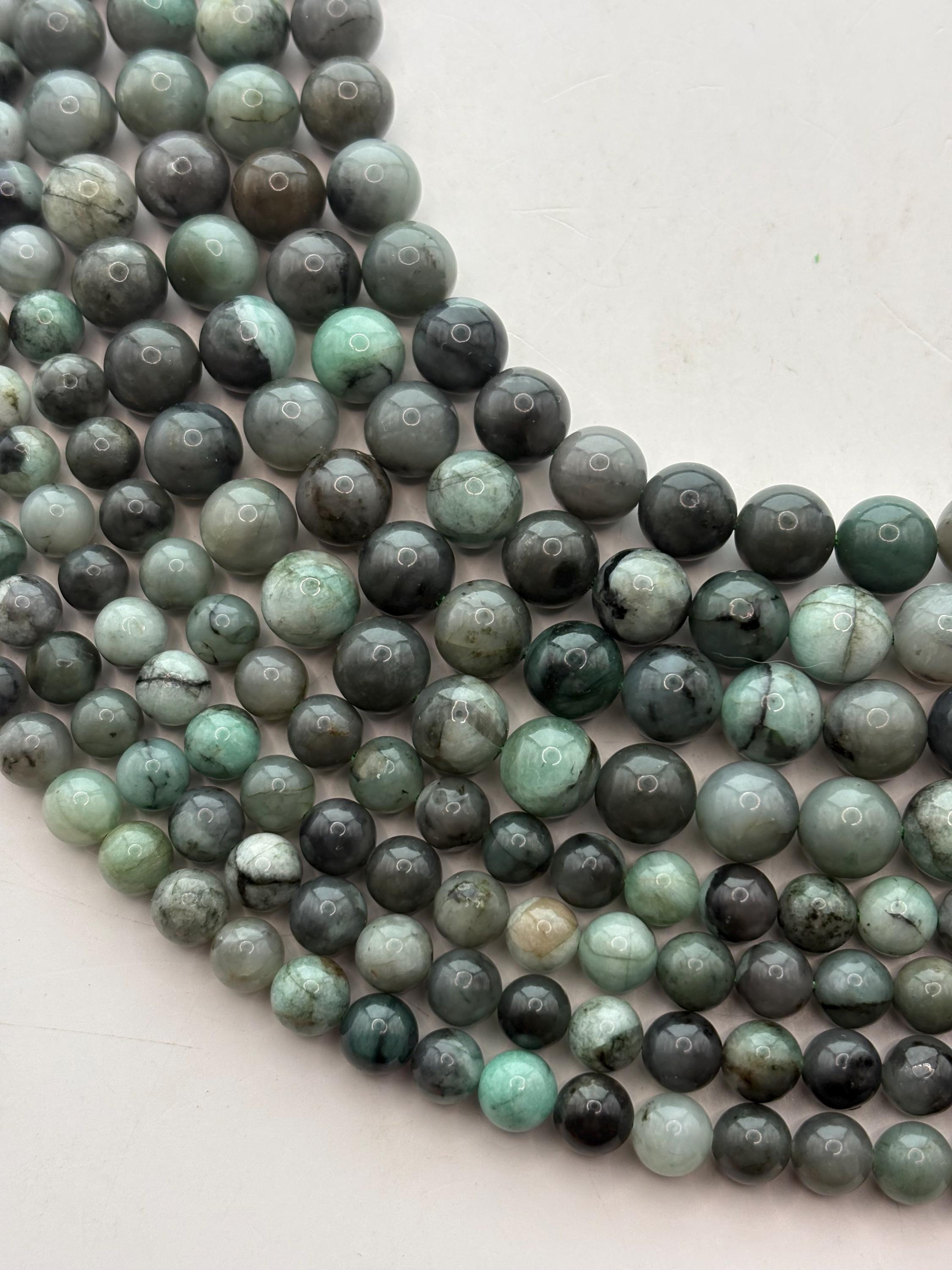 Genuine Emerald Gemstone Beads. 15” Strand Of Round, Mixed Green Emerald Beads, Available In 6-8mm. Genuine Emerald Gemstone Beads. 15” Strand Of Round, Mixed Green Emerald Beads, Available In 6-8mm.