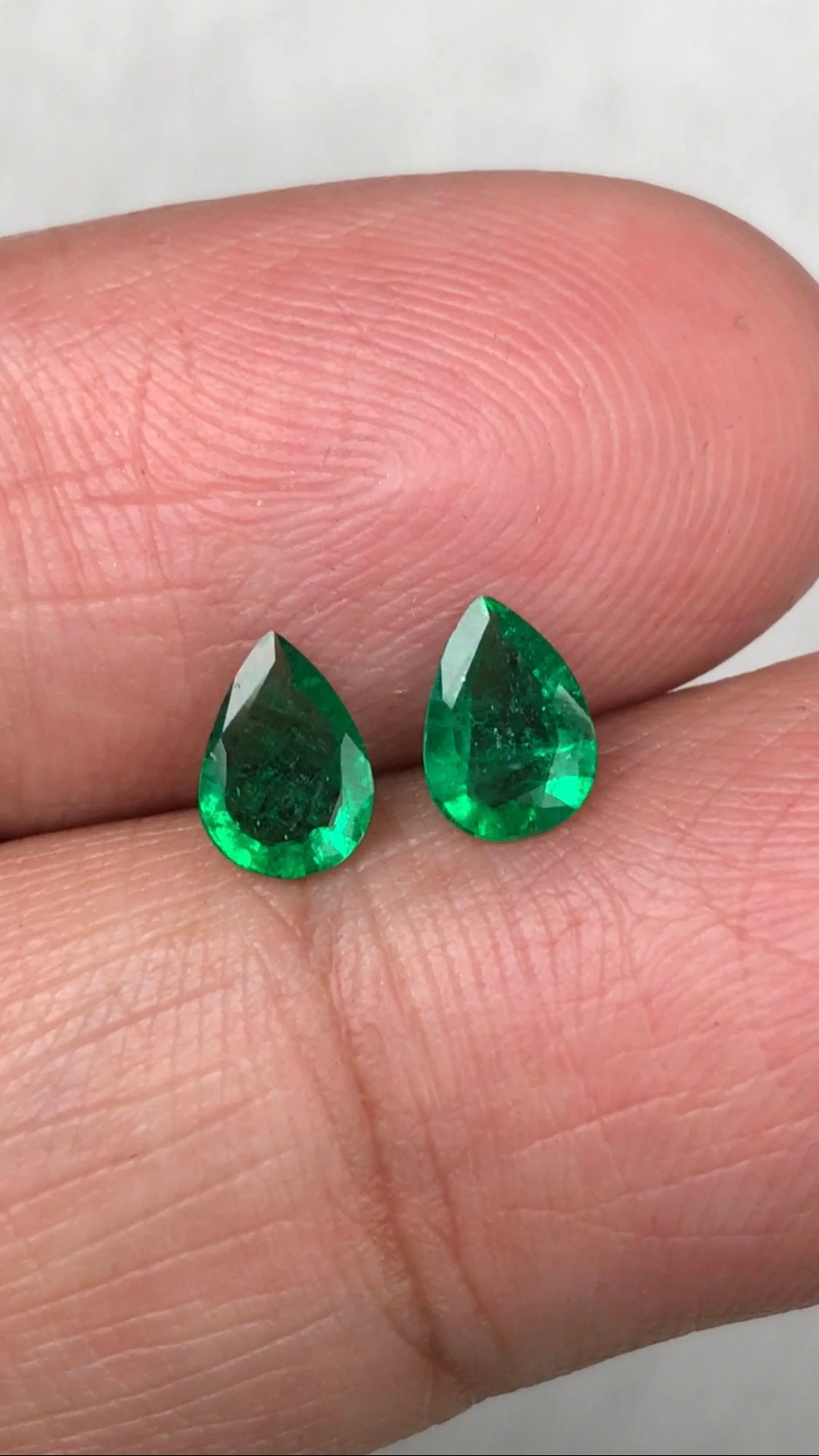 Emerald Pear Cut Pair: 0.71 Ct Vivid Golden Green Loose Gemstones