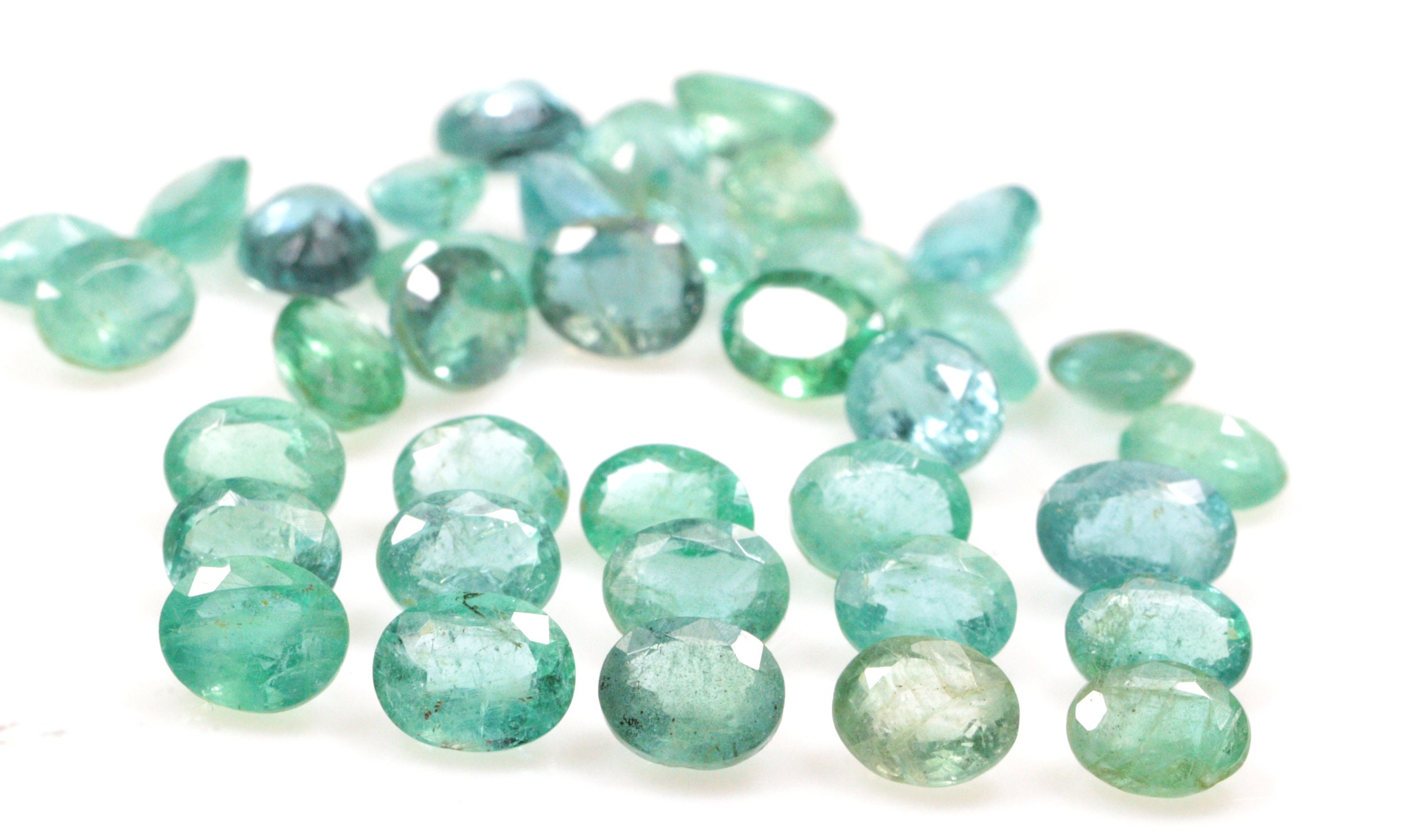 Zambian Emerald: Faceted Oval Loose Gemstone (4x5 Mm)