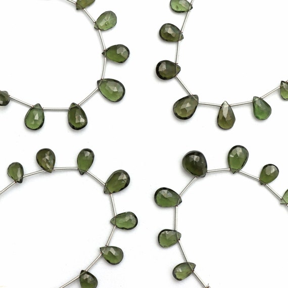 Faceted Pear Moldavite Beads, Aaa++ Quality, 8 Inch Strand Faceted Pear Moldavite Beads, Aaa++ Quality, 8 Inch Strand
