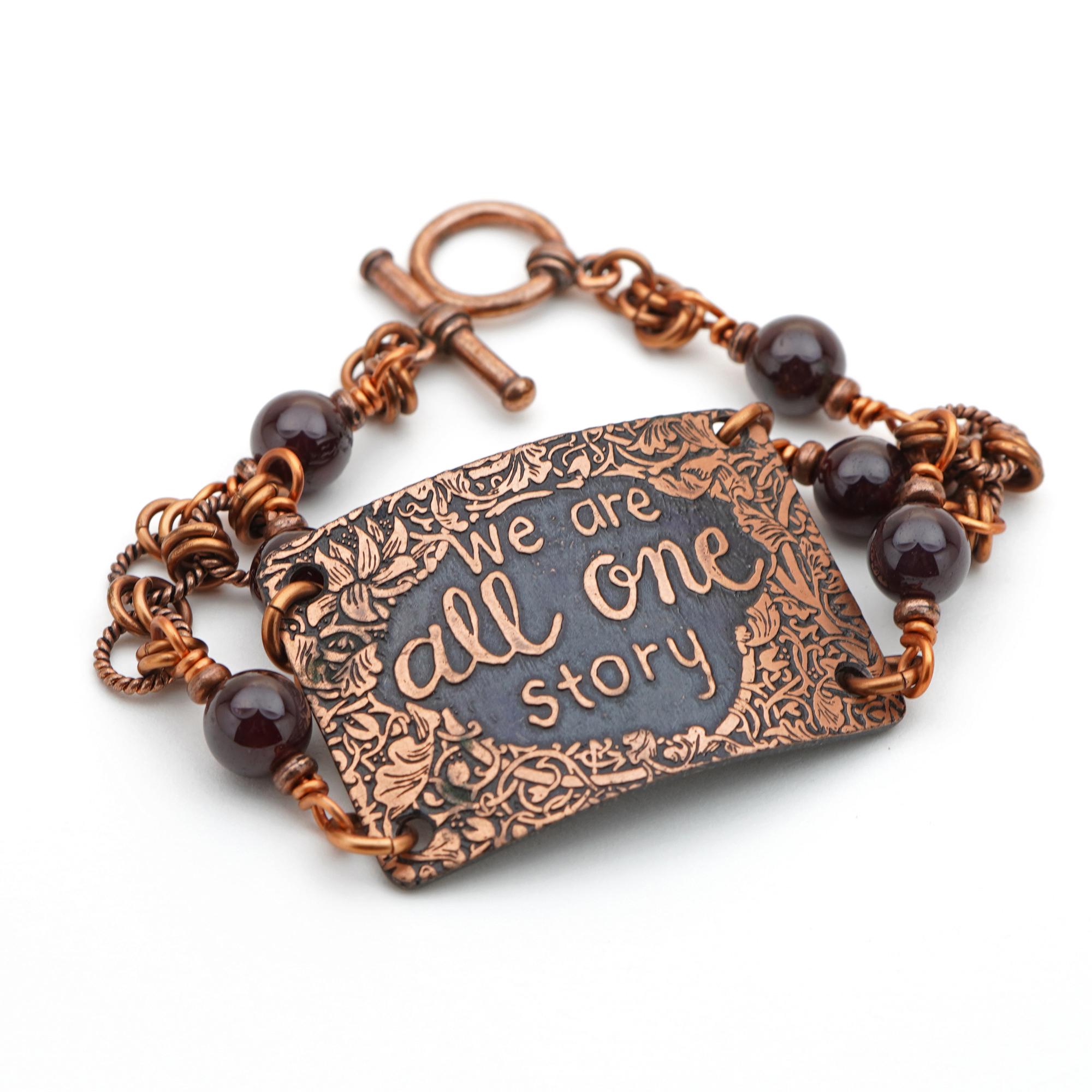 We Are All One Story Bracelet, Dark Red Garnet Beads And Etched Copper, Phrase Jewelry, 7 1/2 Inches Long We Are All One Story Bracelet, Dark Red Garnet Beads And Etched Copper, Phrase Jewelry, 7 1/2 Inches Long