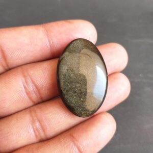 Golden Sheen Obsidian Cabochon: Oval Gemstone for Jewelry (35x23x6 MM, 38.2 Carat Golden Sheen Obsidian Cabochon: Oval Gemstone for Jewelry (35x23x6 MM, 38.2 Carat