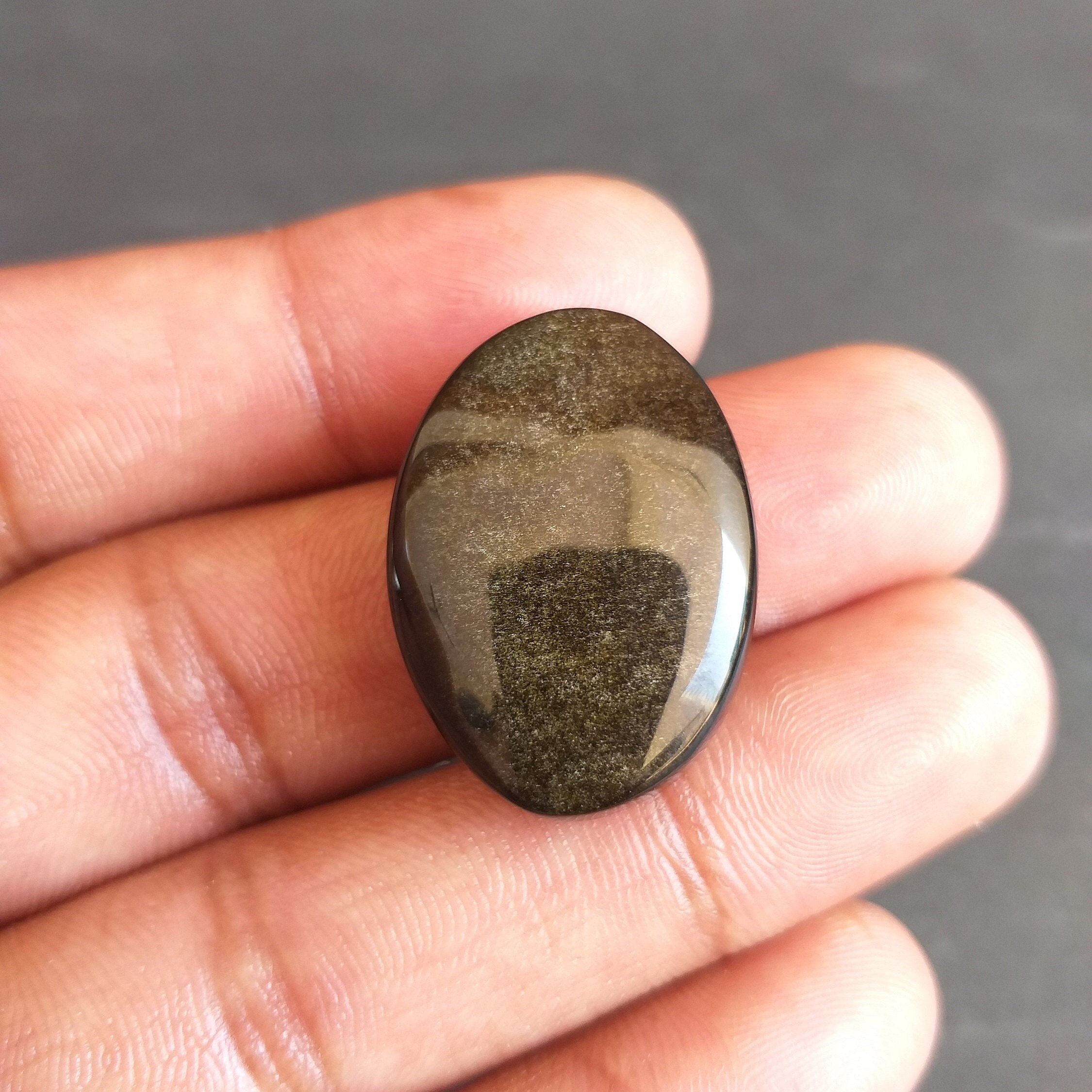 Golden Sheen Obsidian Cabochon: Oval Gemstone For Jewelry (28x20x9 Mm, 37.7 Carat Golden Sheen Obsidian Cabochon: Oval Gemstone For Jewelry (28x20x9 Mm, 37.7 Carat