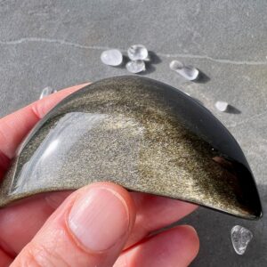 Golden Sheen Obsidian Moon 3 inches Palm Stone for Grounding and Power Golden Sheen Obsidian Moon 3 inches Palm Stone for Grounding and Power