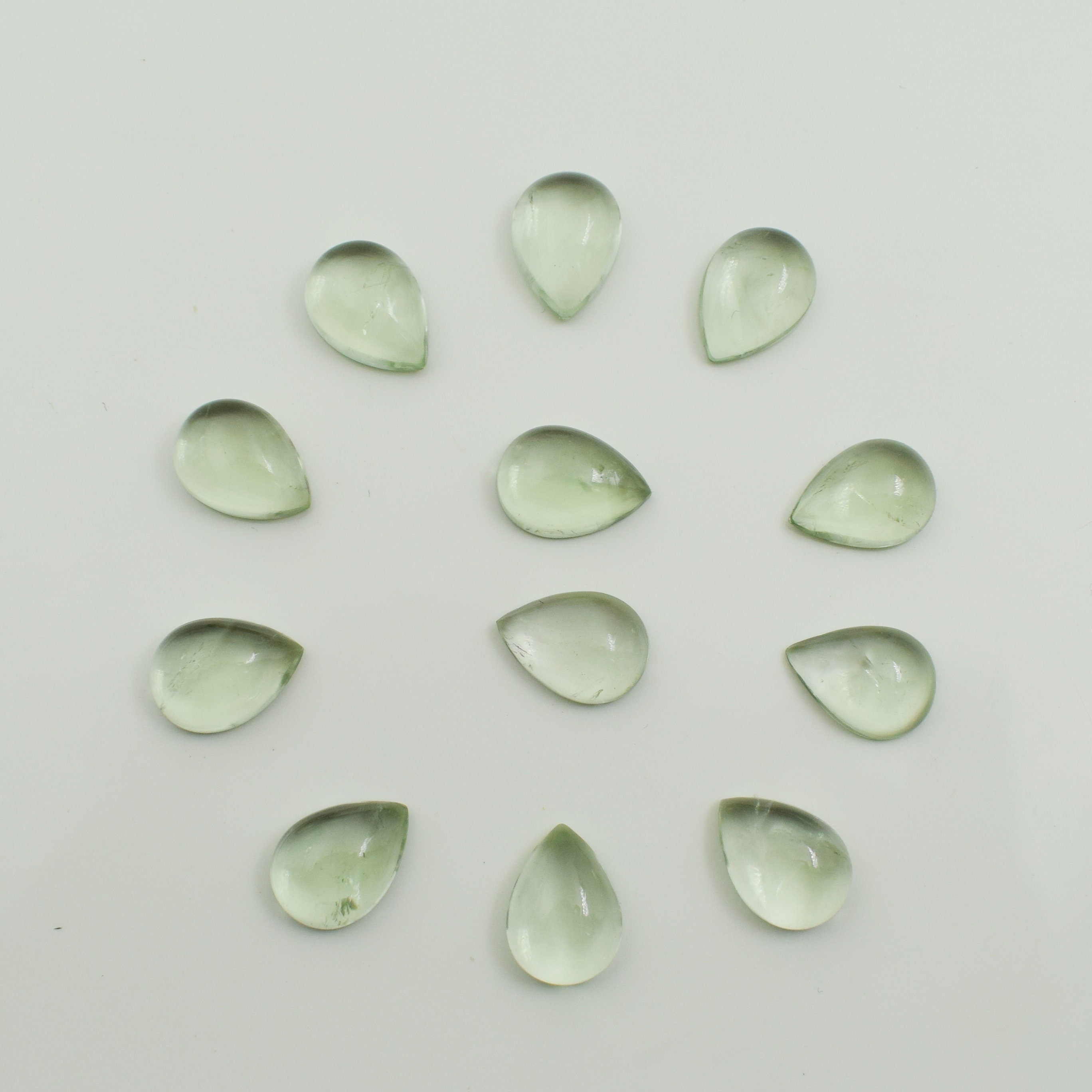 Natural Green Amethyst Pear Shape Cabochon Polished Flat Back Calibrated Whole Sale Gemstone Lot For Jewelry Making All Sizes Available Natural Green Amethyst Pear Shape Cabochon Polished Flat Back Calibrated Whole Sale Gemstone Lot For Jewelry Making All Sizes Available