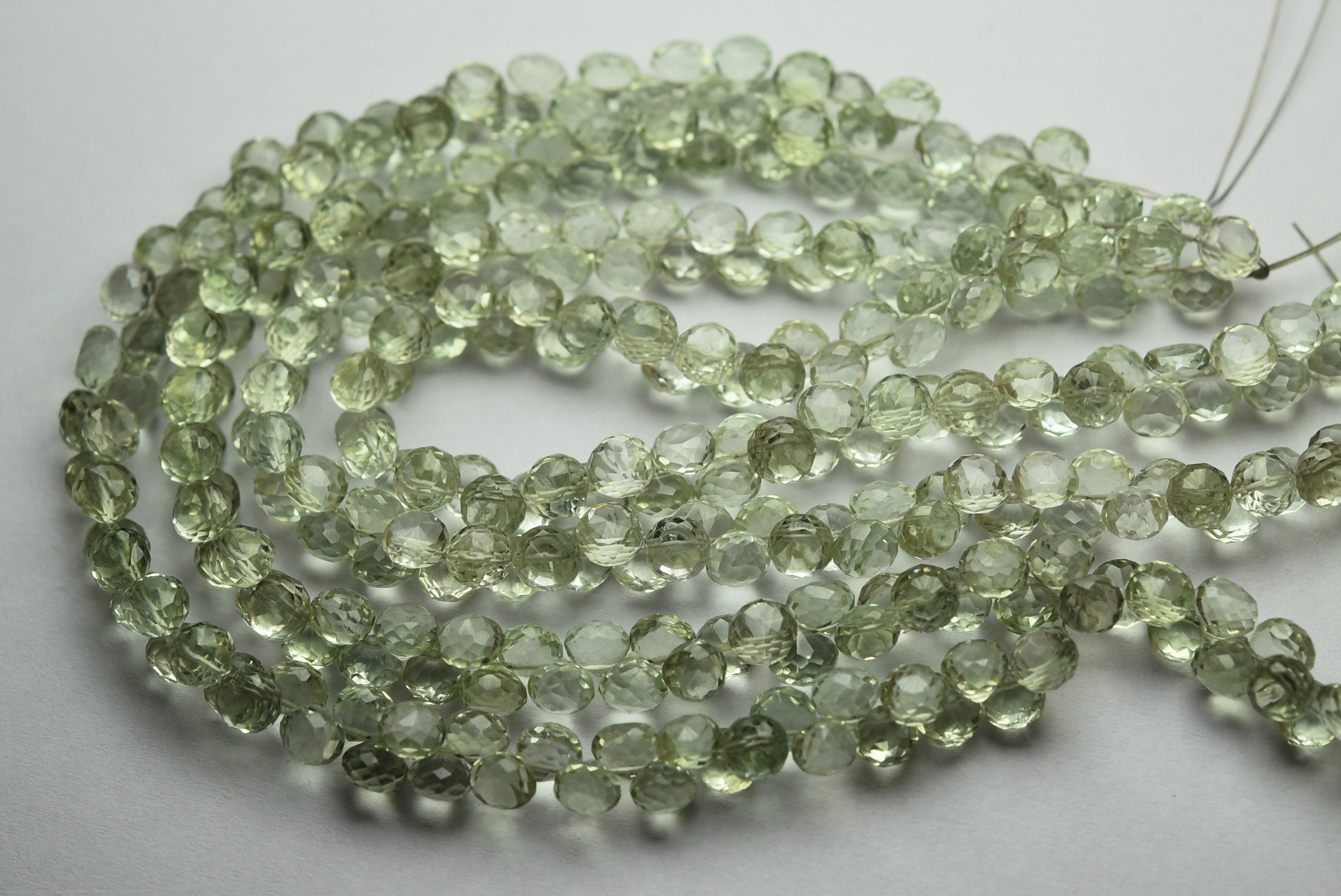 Natural Green Amethyst Faceted Onion Briolettes Strand (7 Inch) Natural Green Amethyst Faceted Onion Briolettes Strand (7 Inch)
