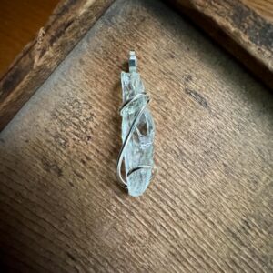 Green amethyst crystal in forged sterling silver pendant