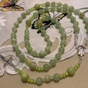 Catholic Rosary Green Calcite Beads which Flow under Black Light Italian Silver Medal and Crucifix Very Relaxing Color