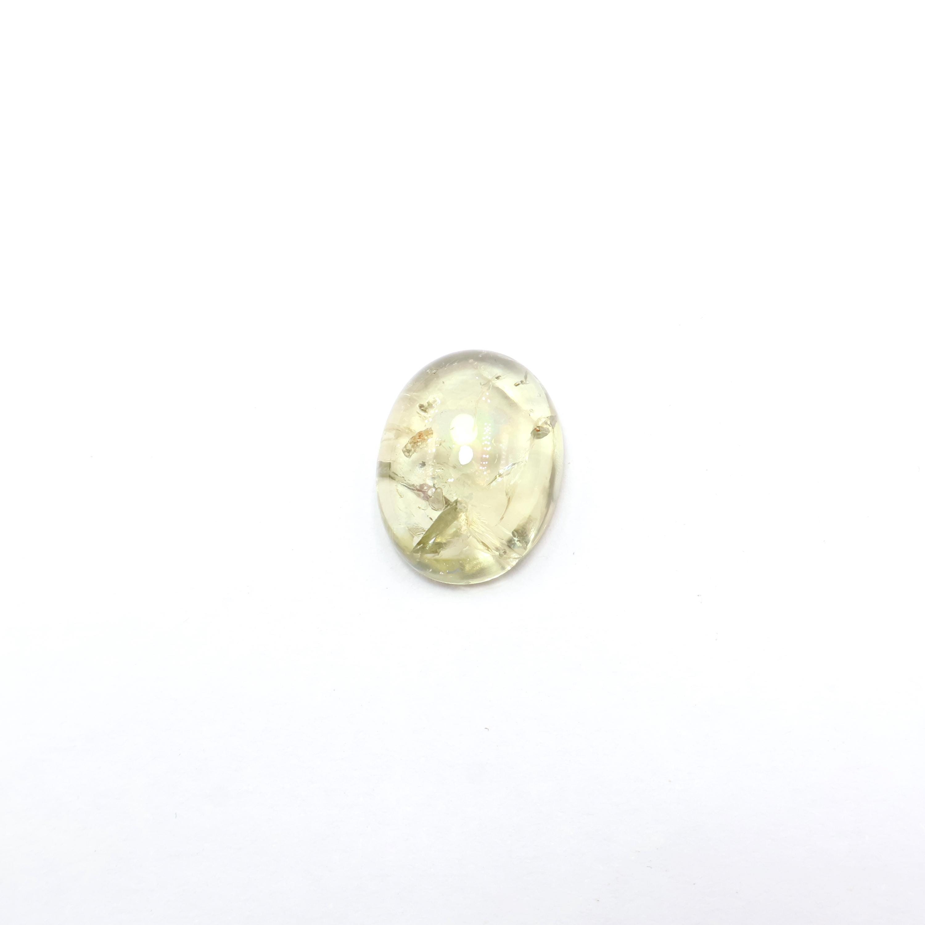 Green Tourmaline Cabochon: 14.60 Ct Oval Gemstone Green Tourmaline Cabochon: 14.60 Ct Oval Gemstone