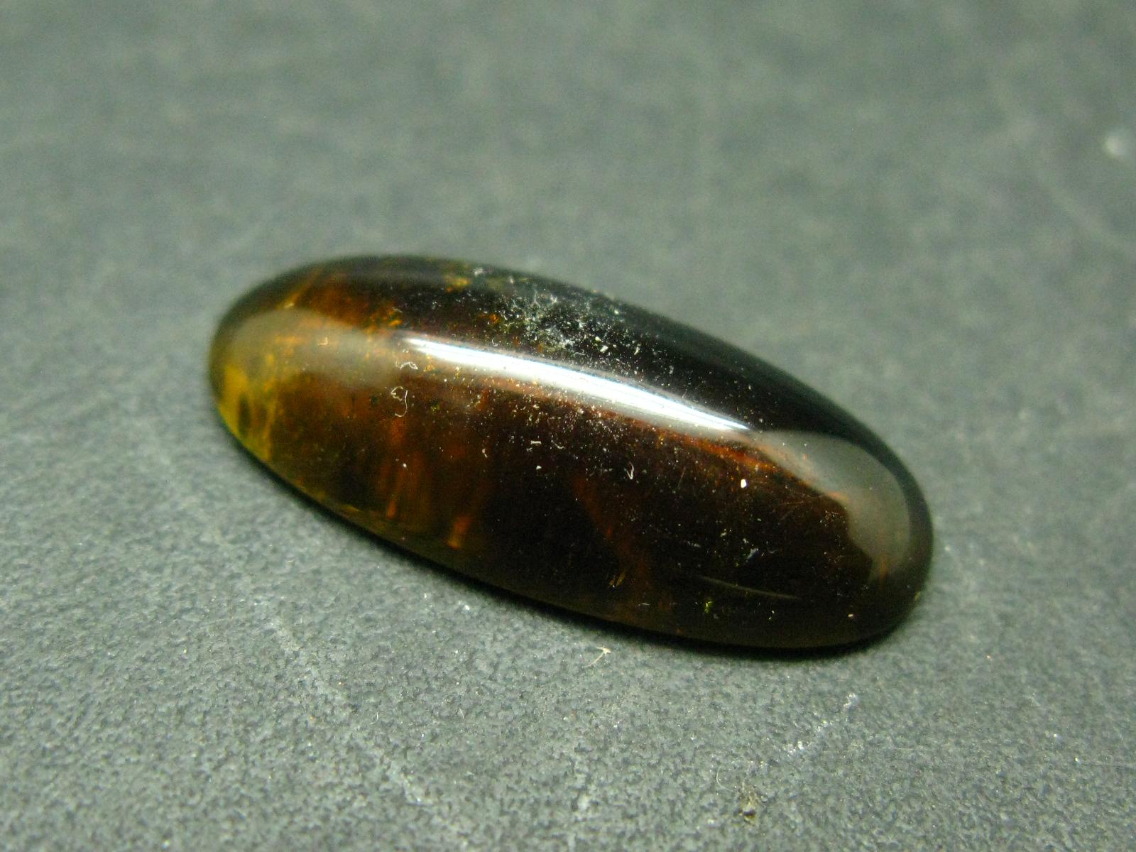 Green Tourmaline Cabochon From Brazil - 10.56 Carats - 22x9mm Green Tourmaline Cabochon From Brazil - 10.56 Carats - 22x9mm