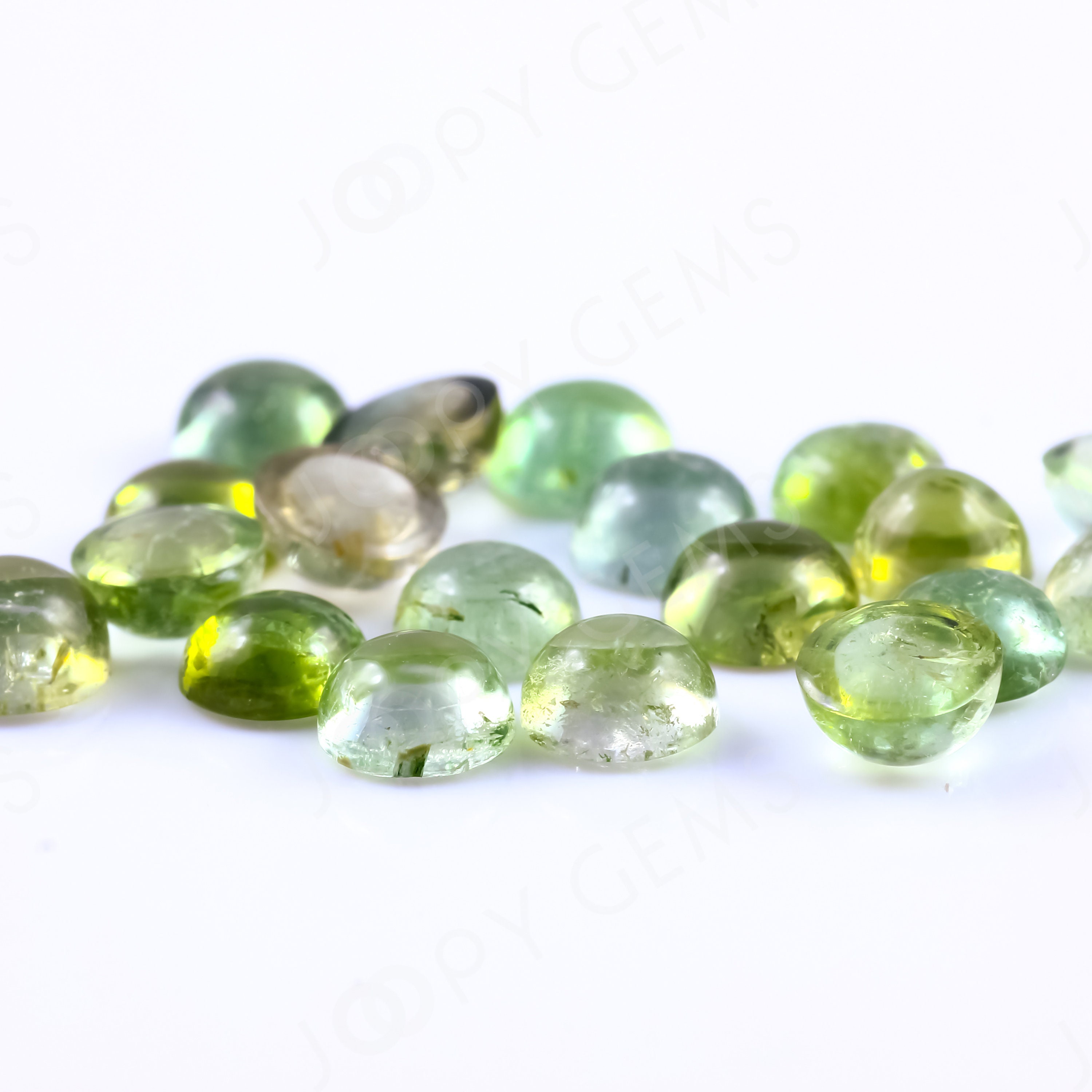 Light Green Tourmaline Cabochon 5mm Round - Per Stone Light Green Tourmaline Cabochon 5mm Round - Per Stone
