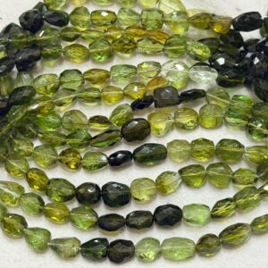 13 Inch Strand, Natural Green Tourmaline Faceted Oval Shaped Beads. 6-8mm 13 Inch Strand, Natural Green Tourmaline Faceted Oval Shaped Beads. 6-8mm