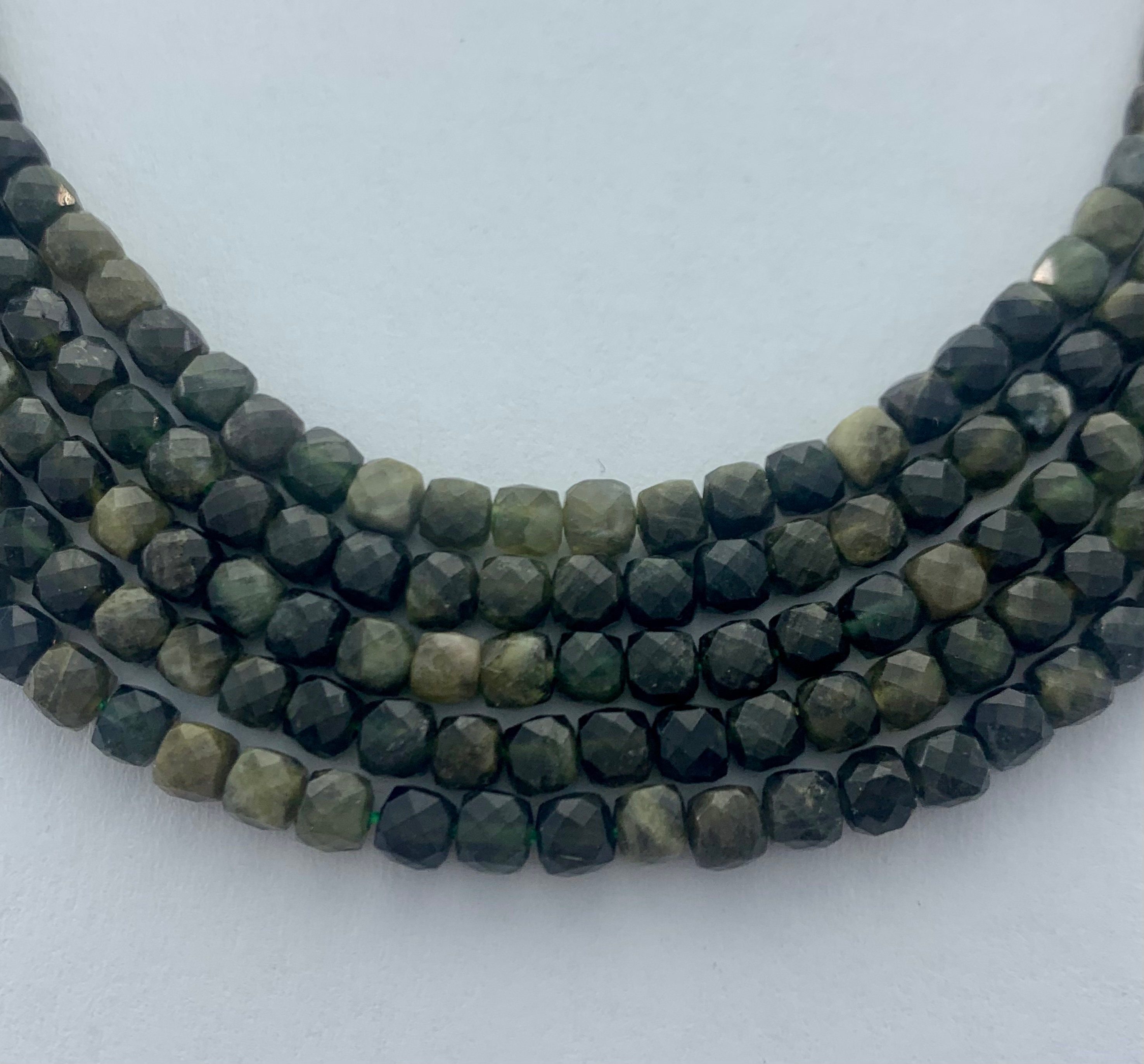 4mm Green Tourmaline Precision Faceted Cube Gemstone Beads. 15" Strands Of Very High Quality Faceted Cubes, Approximately 86 Per Strand. 4mm Green Tourmaline Precision Faceted Cube Gemstone Beads. 15" Strands Of Very High Quality Faceted Cubes, Approximately 86 Per Strand.