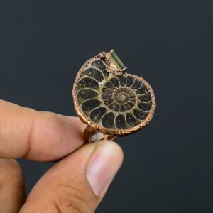 Handmade Copper Electroformed Ammonite Fossil Ring with Green Tourmaline Handmade Copper Electroformed Ammonite Fossil Ring with Green Tourmaline