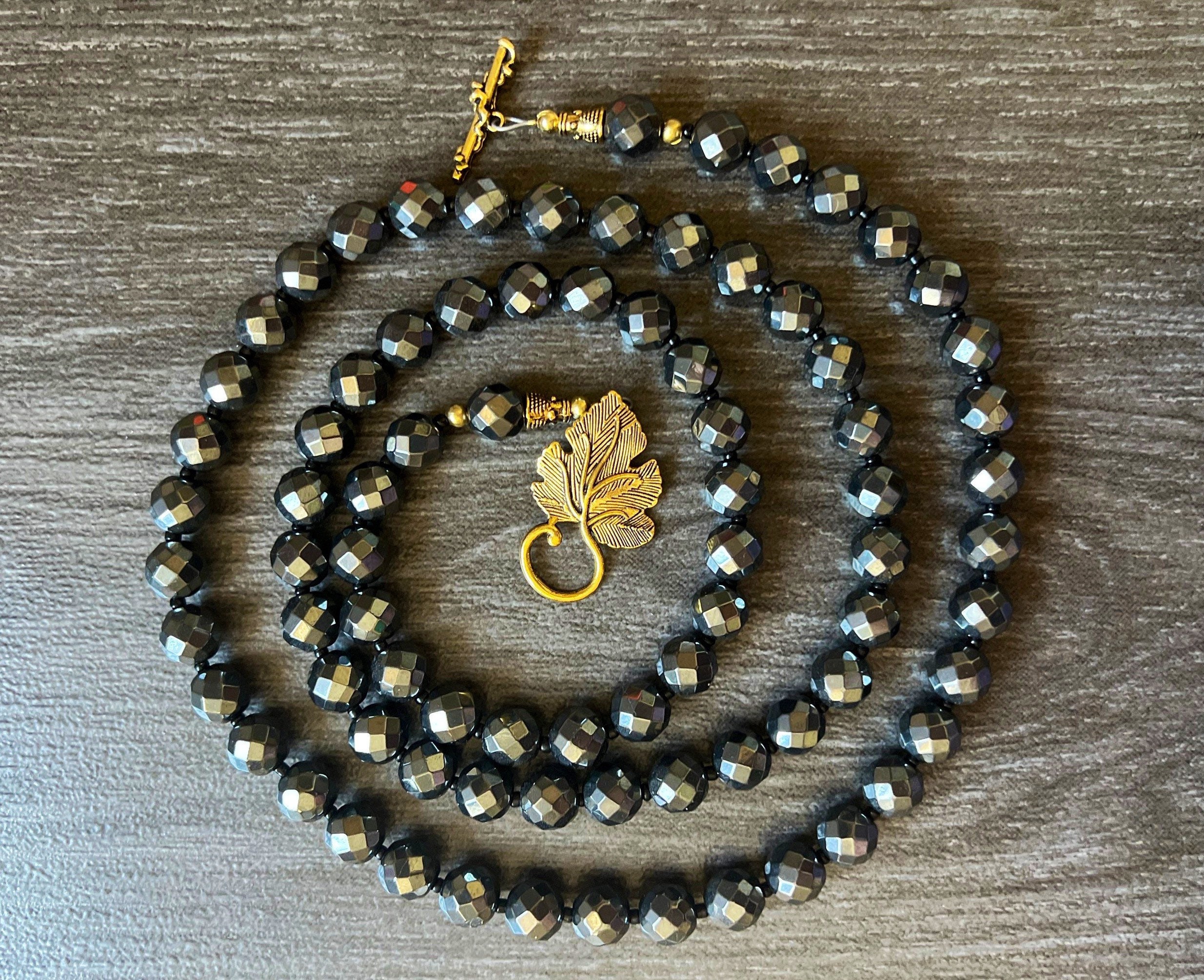 Handmade 39" Hematite Necklace: Faceted Black Gemstone, Gold Leaf Clasp