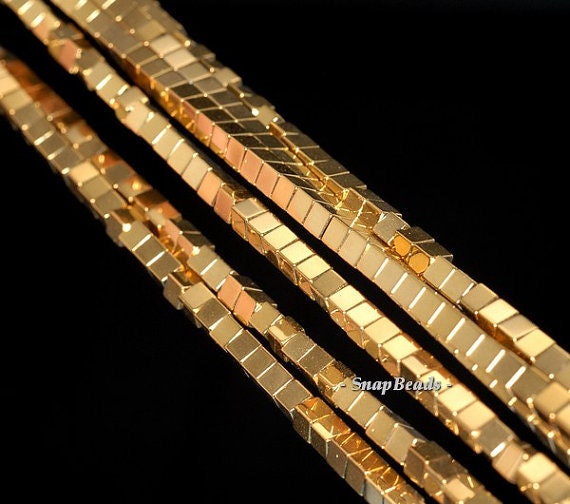 2mm Gold Hematite Gemstone Gold Square Cube 2x2mm Loose Beads 16 Inch Full Strand Lot 1,2,6,12 And 50 (90114803-149) 2mm Gold Hematite Gemstone Gold Square Cube 2x2mm Loose Beads 16 Inch Full Strand Lot 1,2,6,12 And 50 (90114803-149)