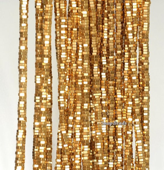 2x1mm Gold Hematite Gemstone Heishi Hexagonal Slice Loose Beads 15.5 Inch Full Strand Lot 1,2,6,12 And 50 (90189098-199) 2x1mm Gold Hematite Gemstone Heishi Hexagonal Slice Loose Beads 15.5 Inch Full Strand Lot 1,2,6,12 And 50 (90189098-199)
