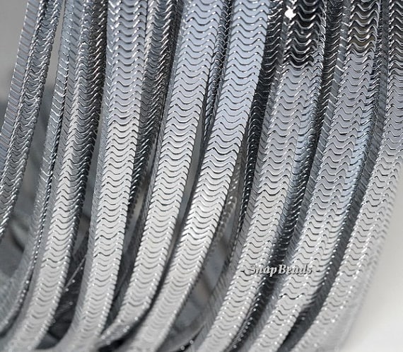 7x2mm Silver Hematite Gemstone Heishi Wave "w" 7x2mm Loose Beads 16 Inch Full Strand Lot 1,2,6,12 And 50 (90185751-840) 7x2mm Silver Hematite Gemstone Heishi Wave "w" 7x2mm Loose Beads 16 Inch Full Strand Lot 1,2,6,12 And 50 (90185751-840)