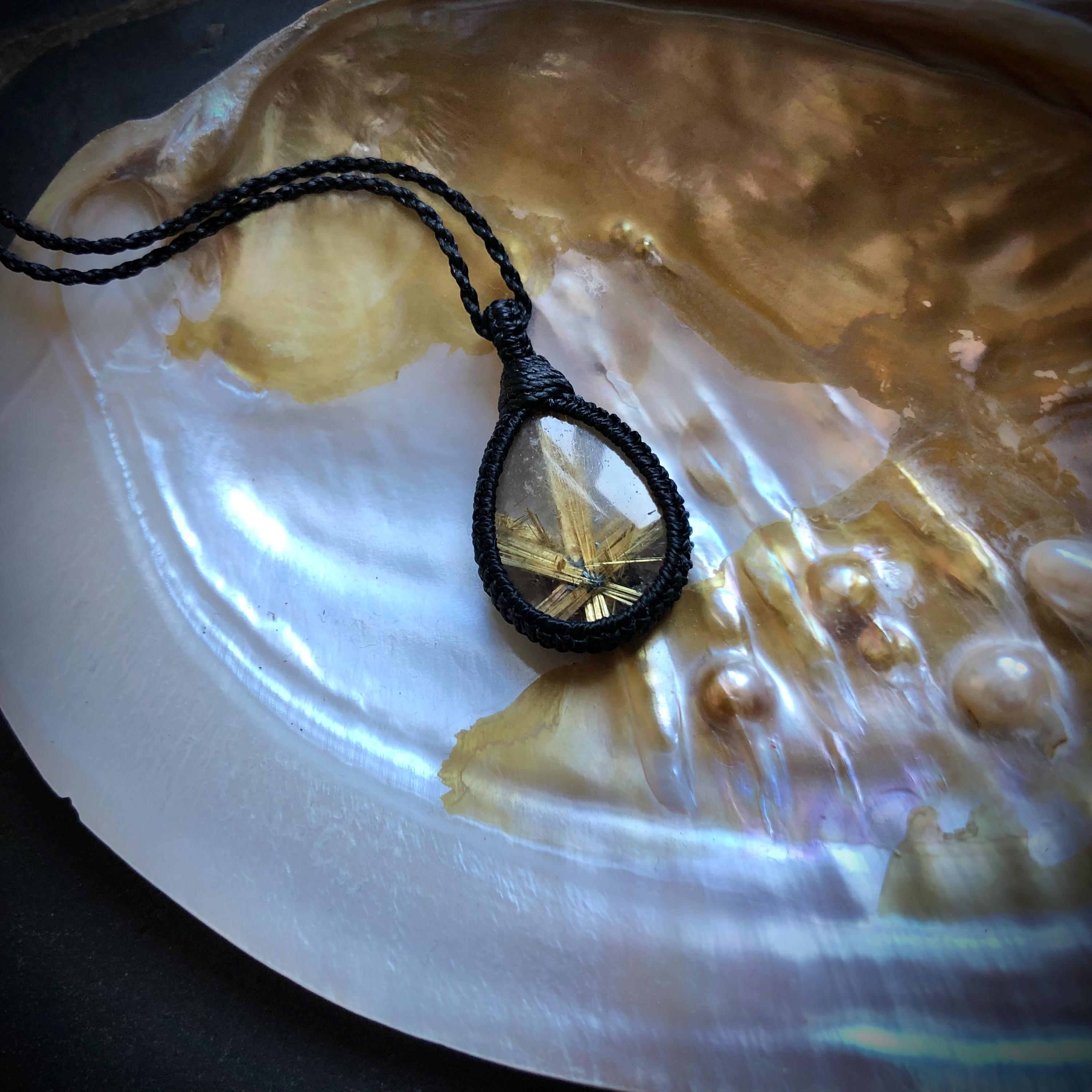 High Quality Perfect Golden Star Rutile Pendant With Hematite Centre And Black Cord
