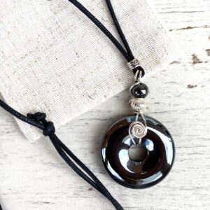 Large hematite donut necklace, Pi gemstone,  with  Sterling silver wire wrapped pendant. unusual Iron anniversary gift. Adjustable length