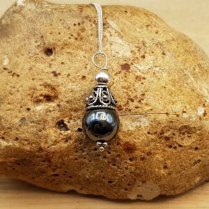 Minimalist Hematite cone pendant. Reiki jewelry uk. Grey semi precious stone. 10mm stone. Bali silver necklaces for women.