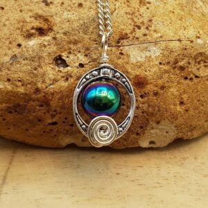 Small rainbow Hematite pendant. Reiki jewelry. Minimalist Grey oval frame Wire wrapped pendant uk. 10mm stone. Empowered crystals