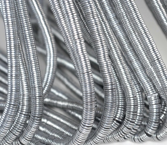 6x1mm Silver Hematite Gemstone Slice Heishi Round Disc 6x1mm Loose Beads 16 Inch Full Strand Lot 1,2,6,12 And 50 (90185643-844) 6x1mm Silver Hematite Gemstone Slice Heishi Round Disc 6x1mm Loose Beads 16 Inch Full Strand Lot 1,2,6,12 And 50 (90185643-844)