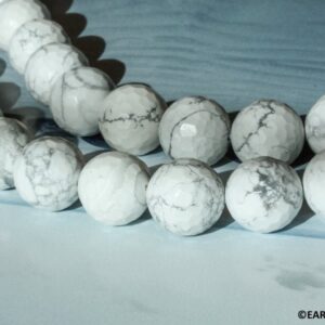 White Howlite 18mm/ 16mm Faceted Round beads 15.5" strand White Howlite 18mm/ 16mm Faceted Round beads 15.5" strand